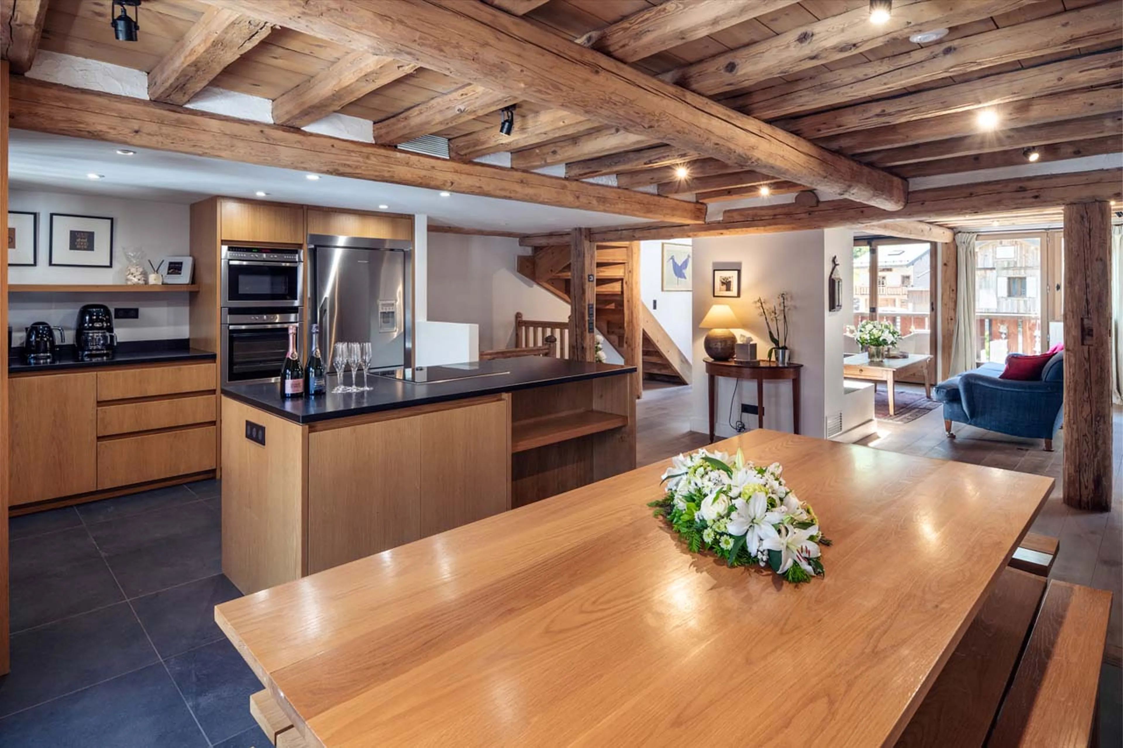Kitchen and dining table in Chalet Pierremont, Courchevel Le Praz