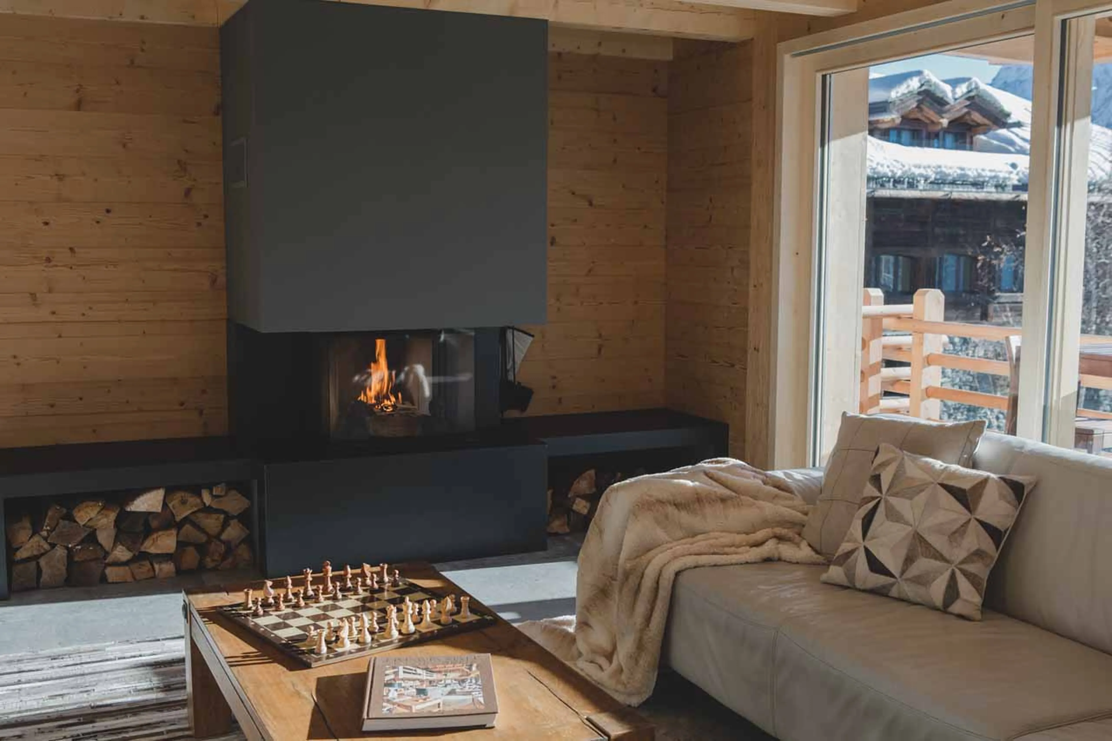 Fireplace in living area at Chalet Pierrepointe in Verbier