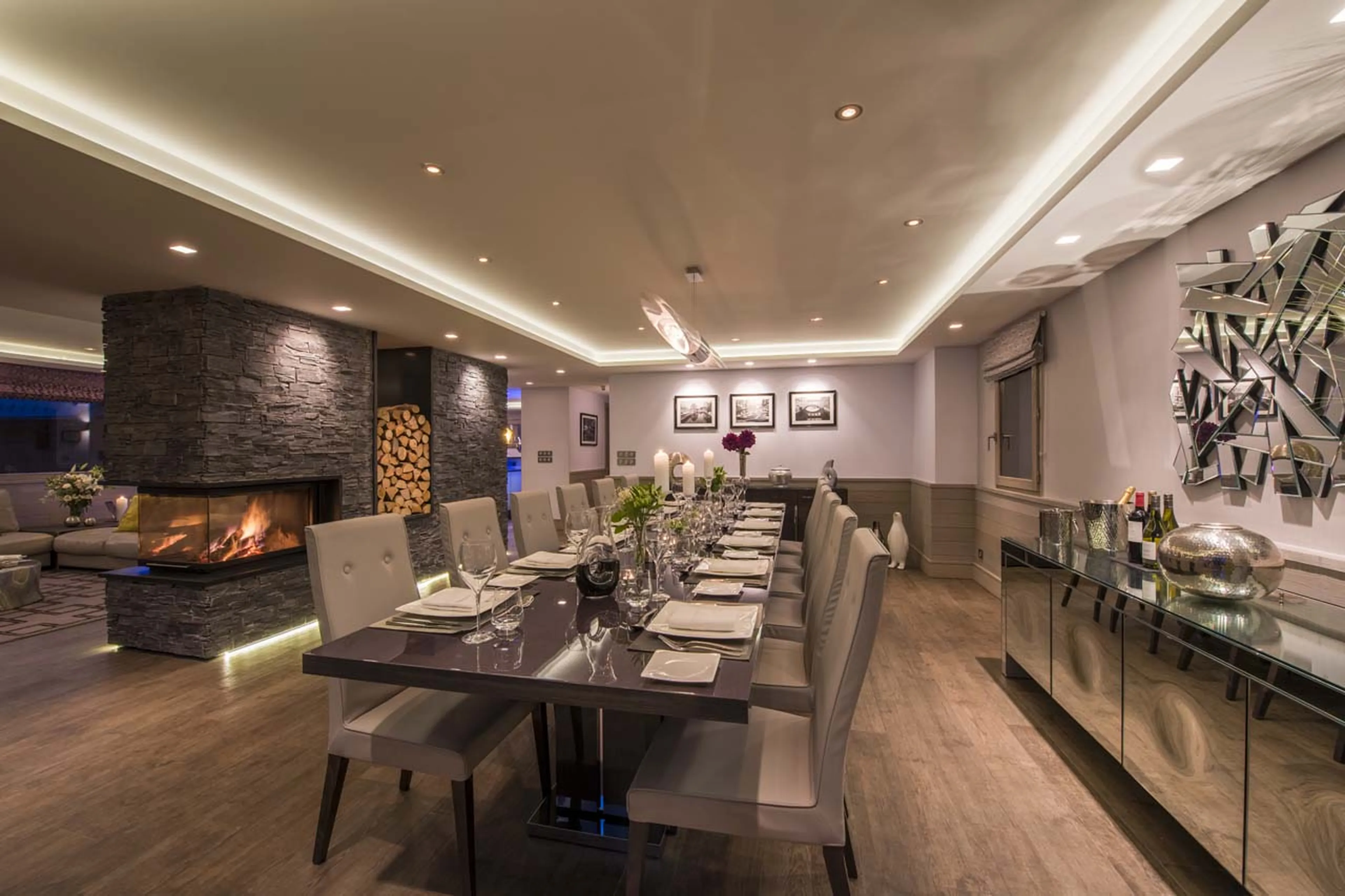 Dining area at night at Chalet Pont du Cam in Meribel