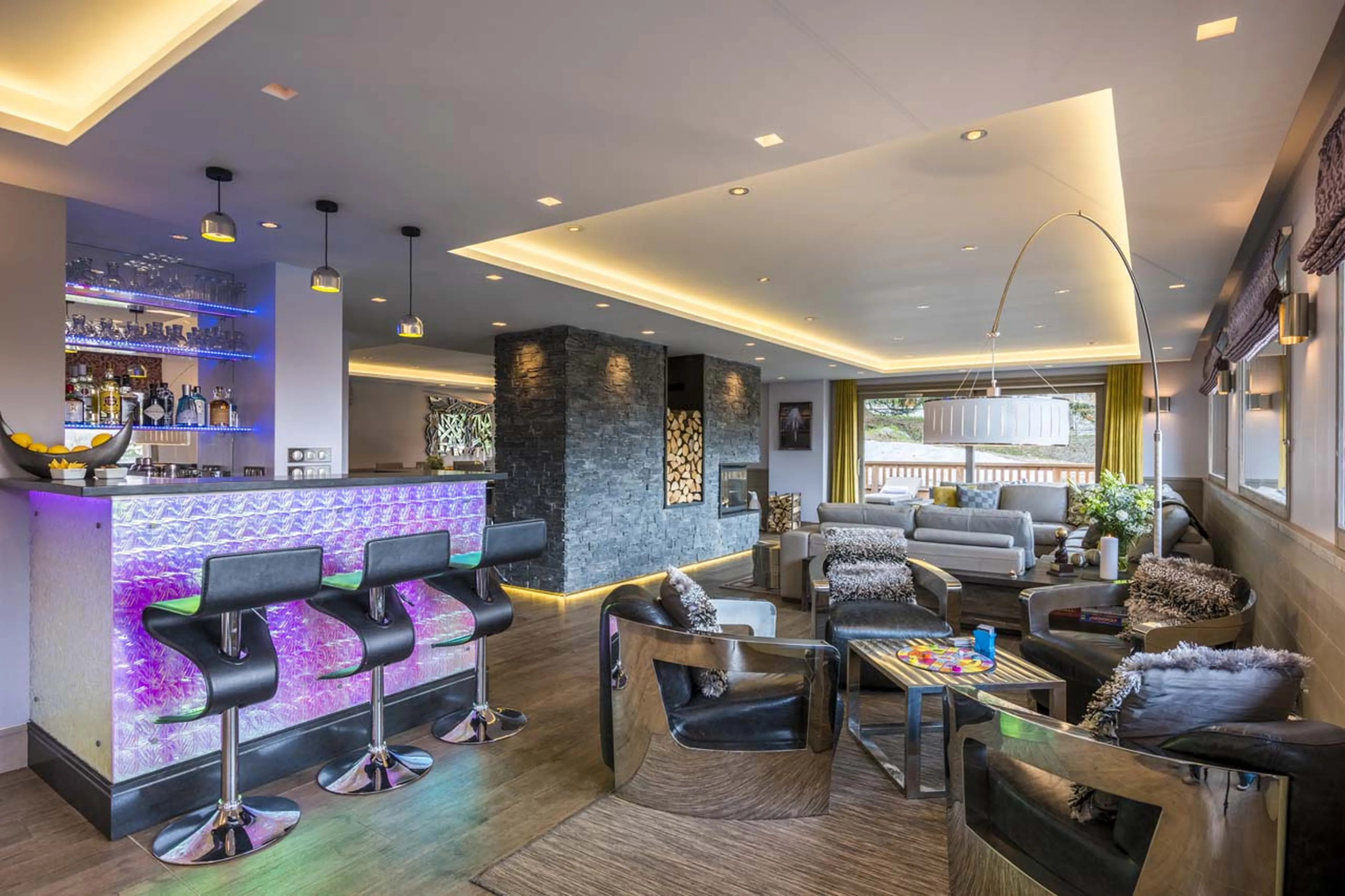 Champagne bar and seating area at Chalet Pont du Cam in Meribel