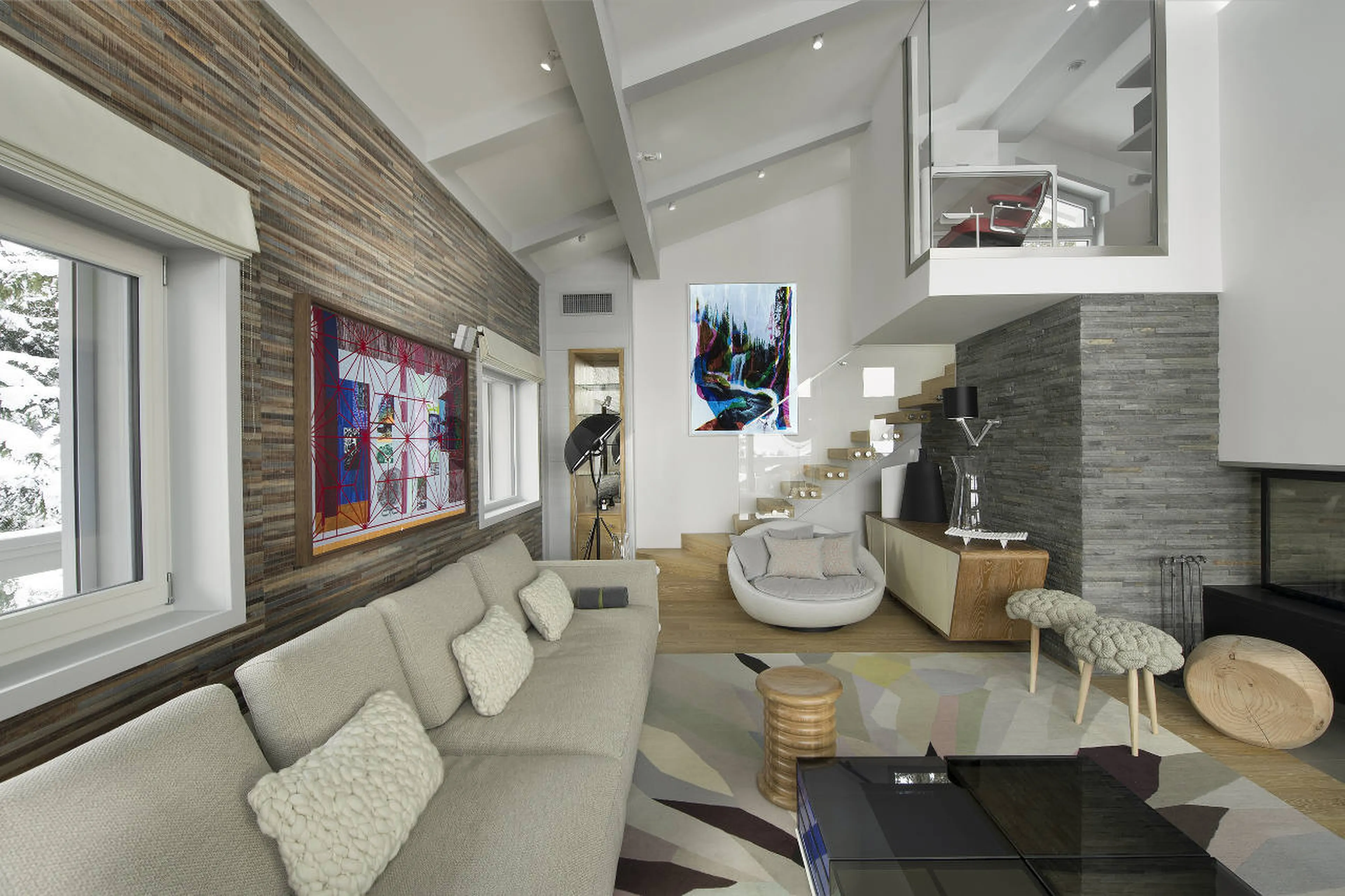 Living area with mezzanine office in Open plan living and dining area