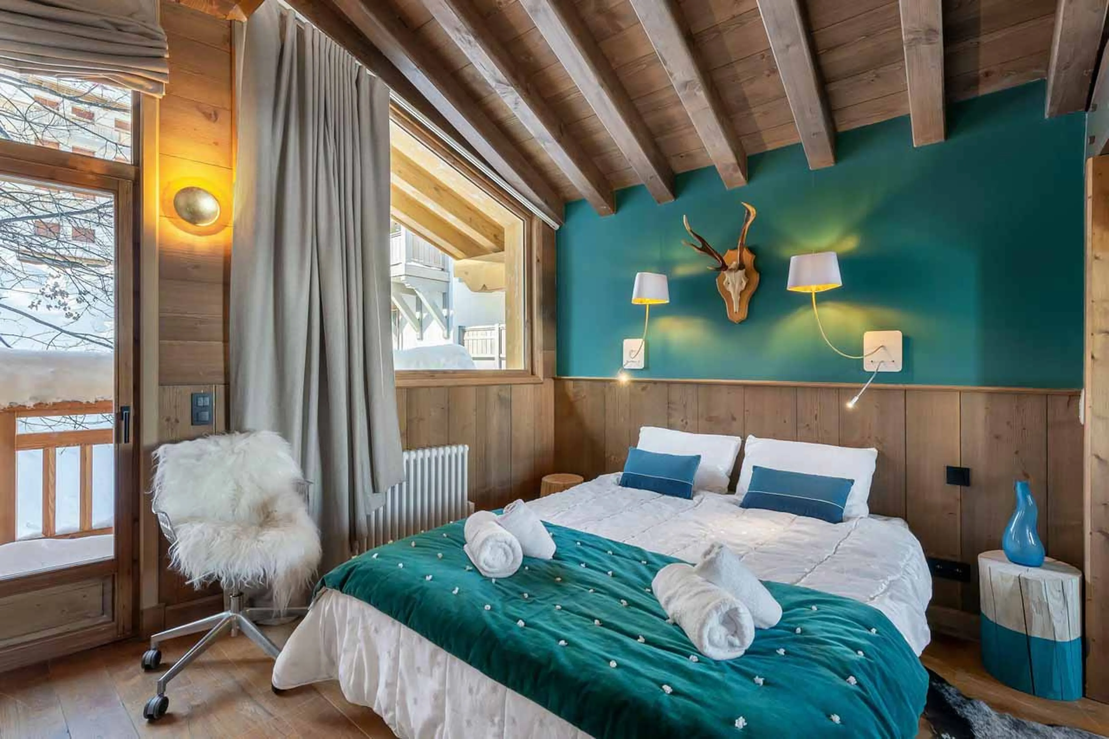 Balcony and master suite at Chalet Prosper in Courchevel 1550