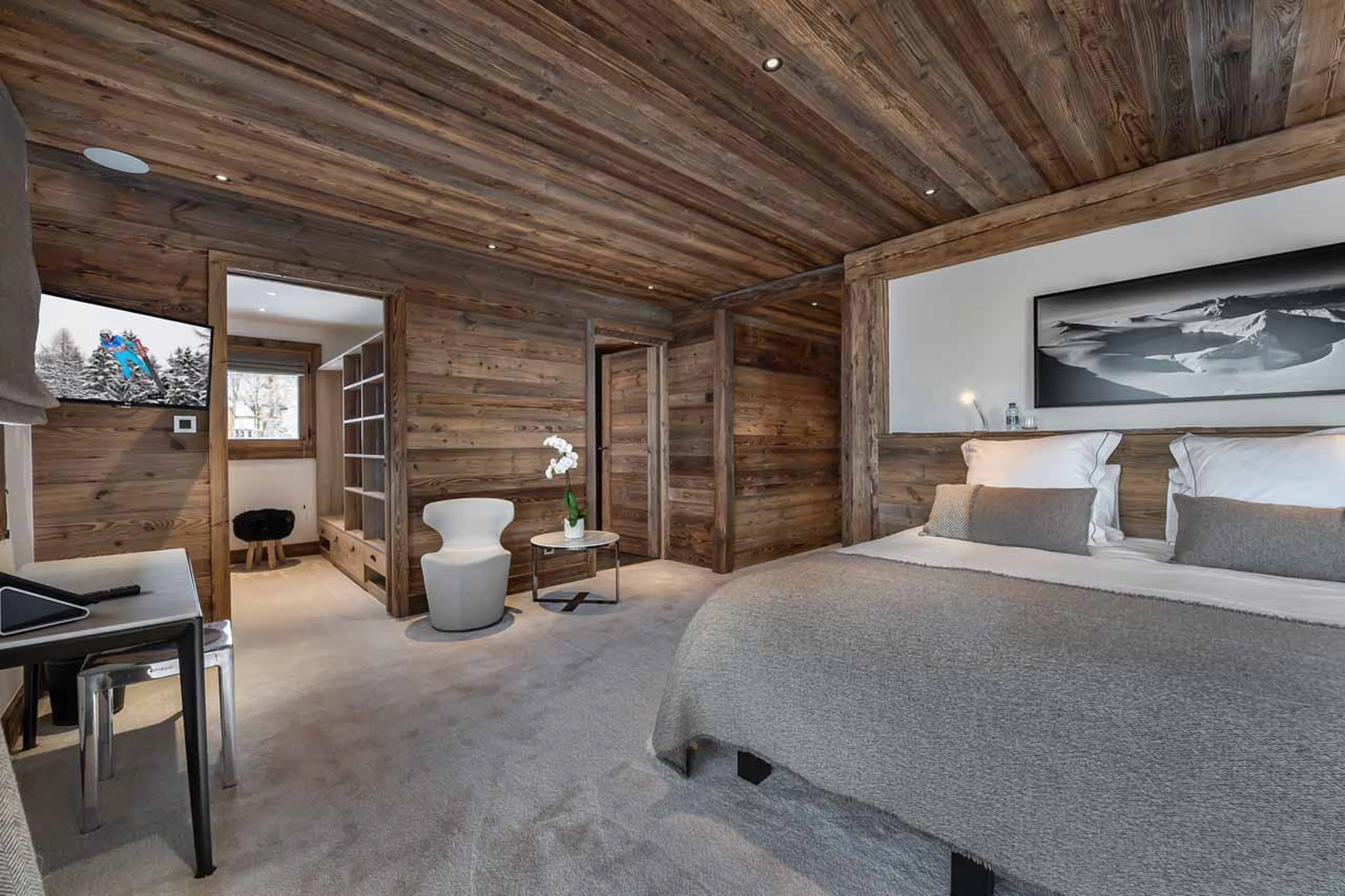Bedroom one with dressing room at  Chalet Pure Black Crystal in St Martin de Belleville