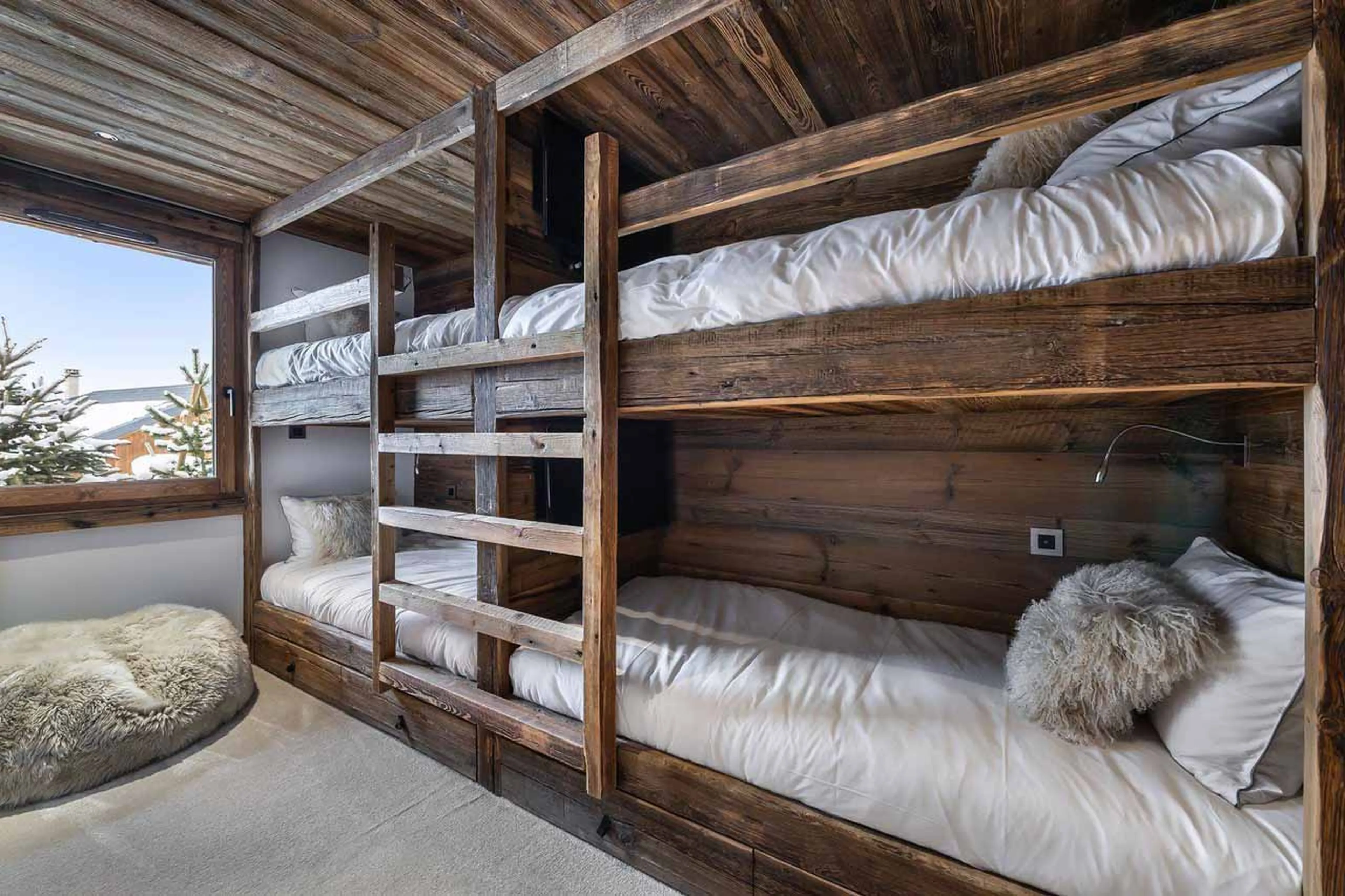 Bedroom five at Chalet Pure Black Crystal in St Martin de Belleville