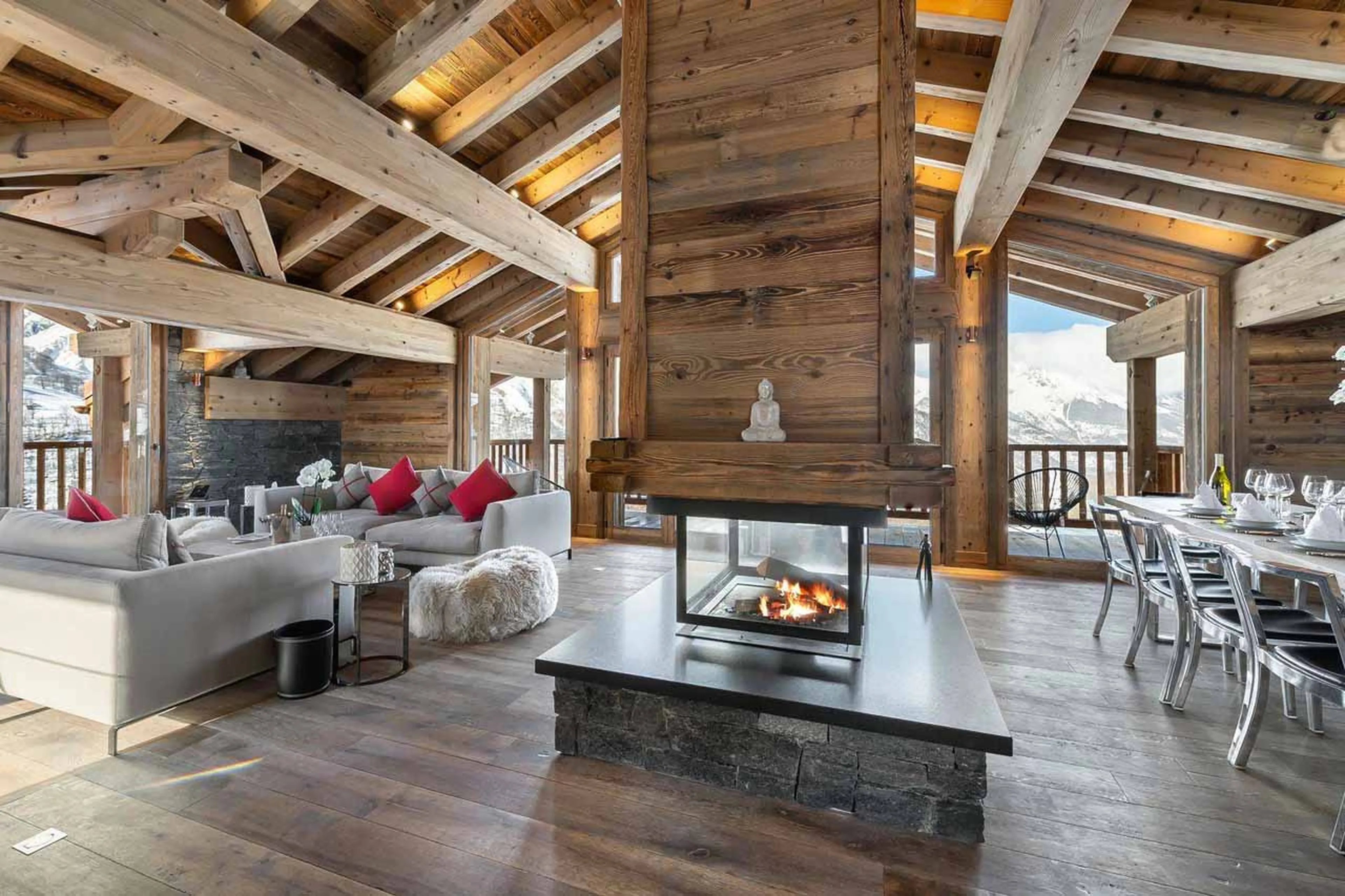 Living room with fireplace at Chalet Pure White Crystal in St Martin de Belleville