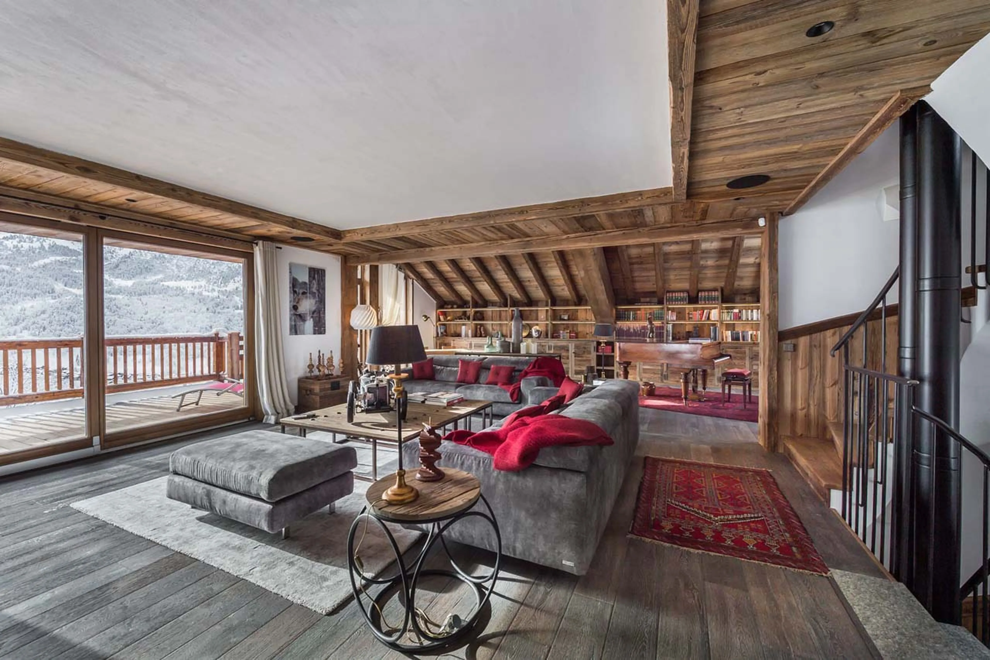 Terrace access from living area at Chalet Queen Mijane in Meribel