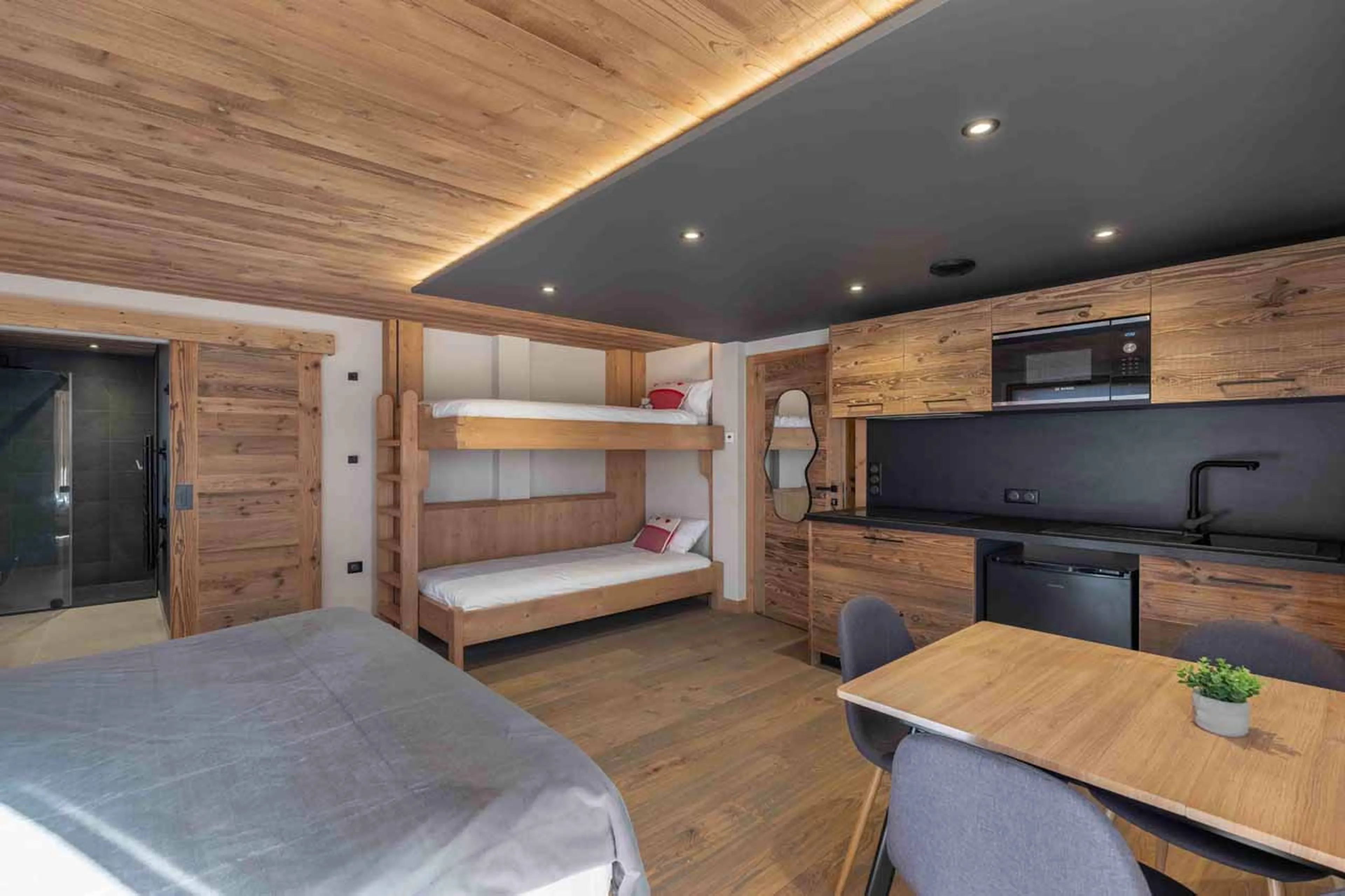 Bedroom 4 kitchen at Chalet Reve de Marmotte in Meribel