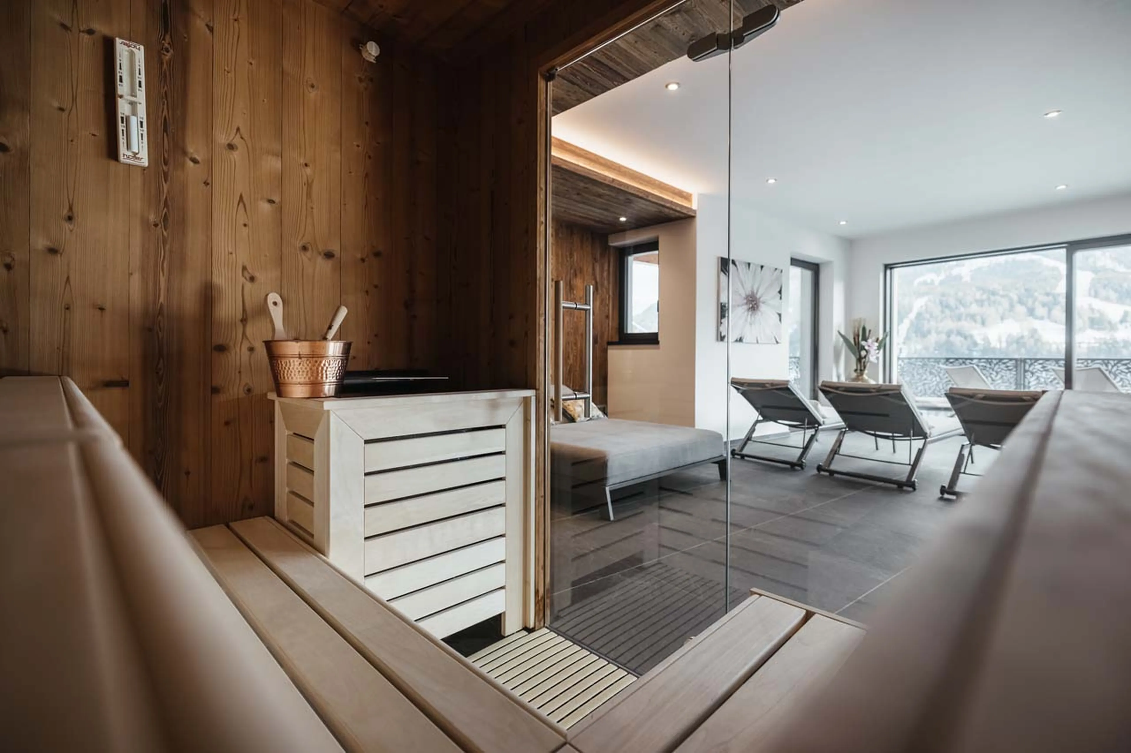 Glass-fronted sauna in Chalet Robin, Val Gardena