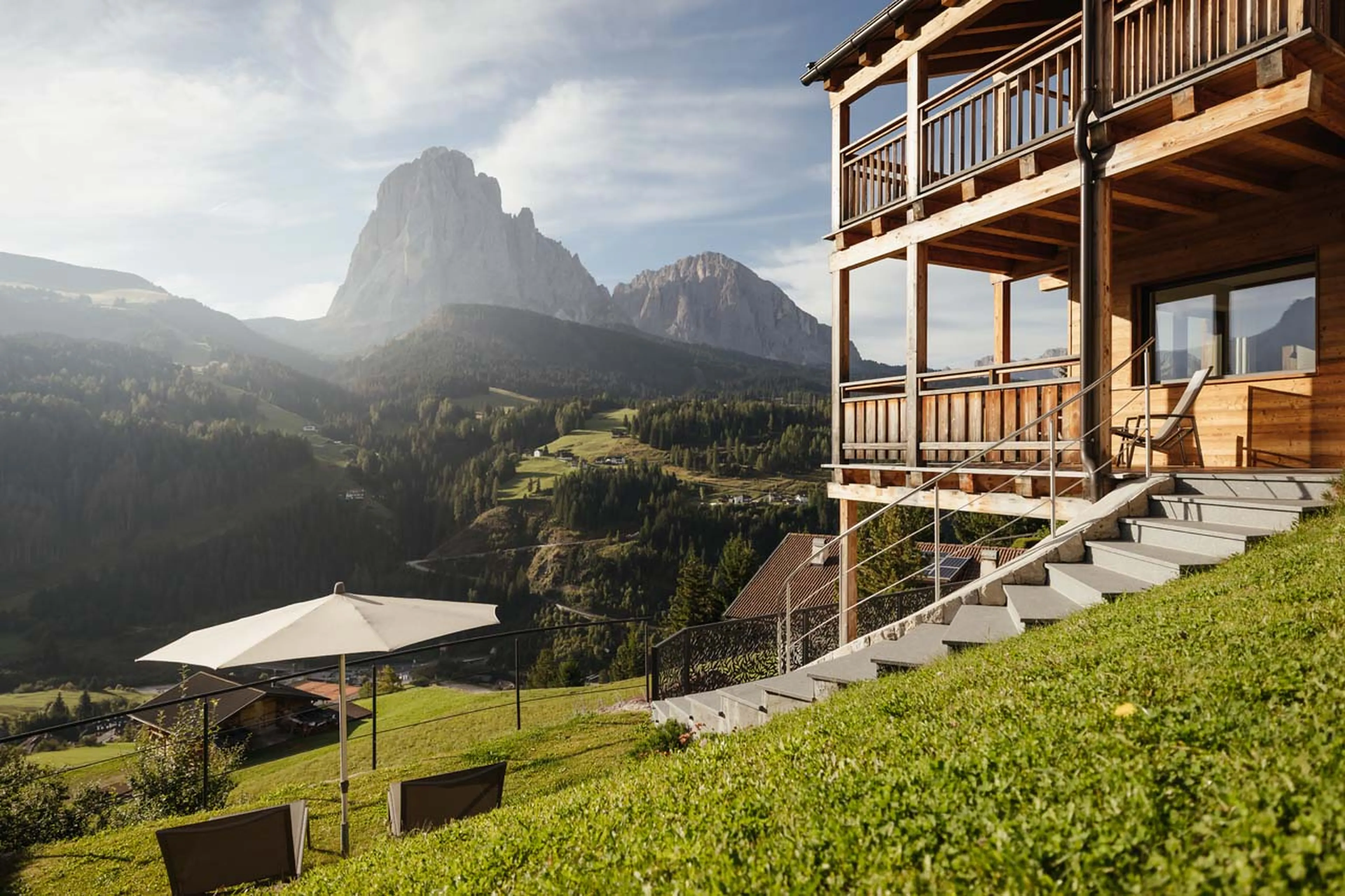 Exterior with mountain views in summer in Chalet Robin, Val Gardena