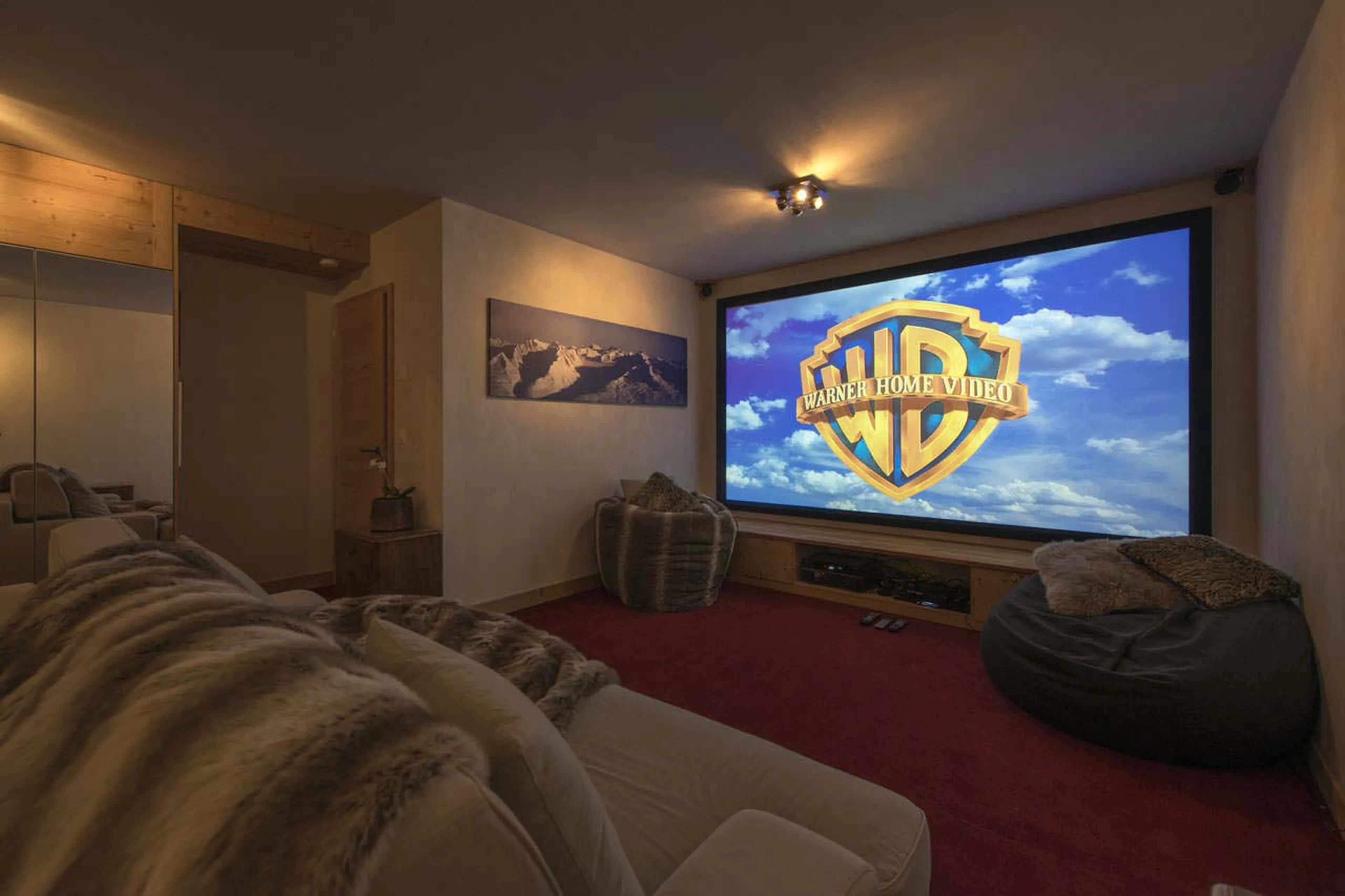 Seating in cinema room at Chalet Rock in Verbier