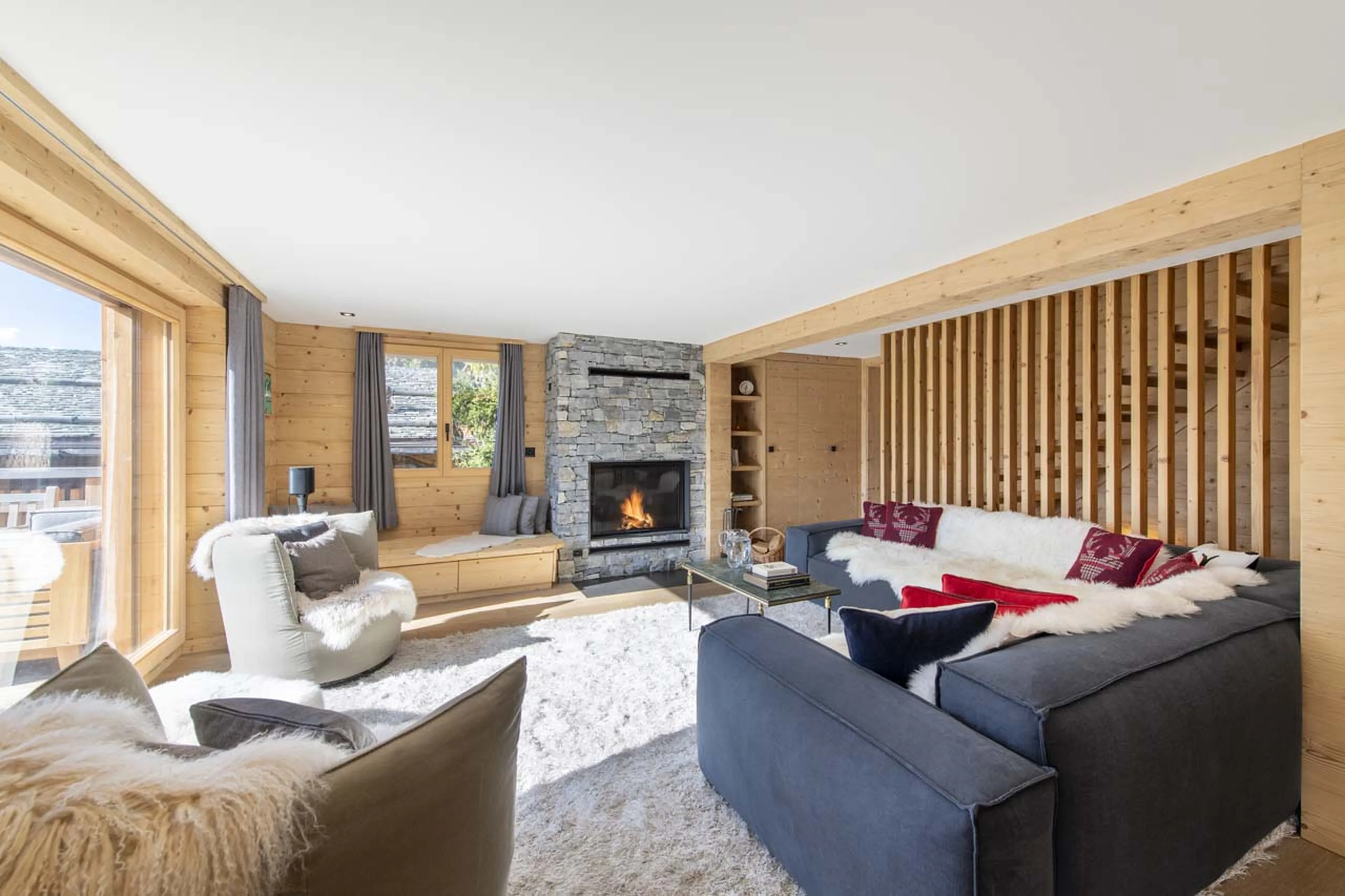 Fireplace in living area at Chalet Roselle in Verbier