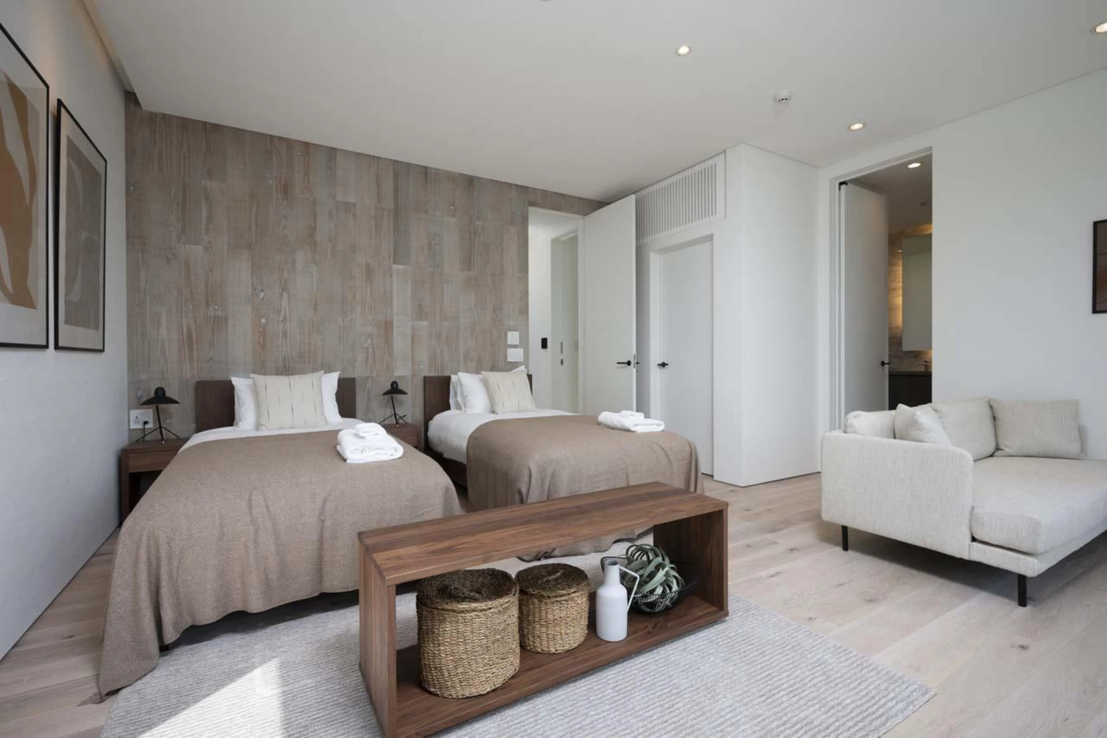 Sleek bedroom with neutral tones at Chalet Ryoun in Niseko