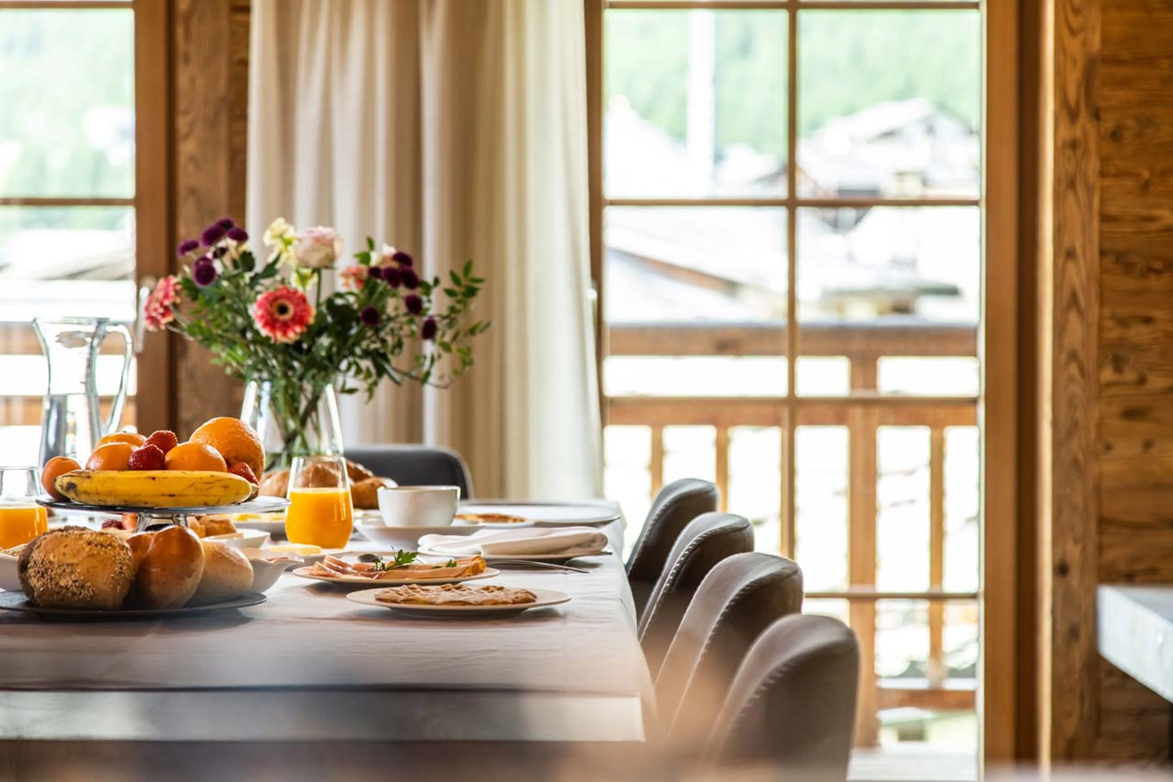 Access to balcony from living area at Chalet Simon in Saas Fee