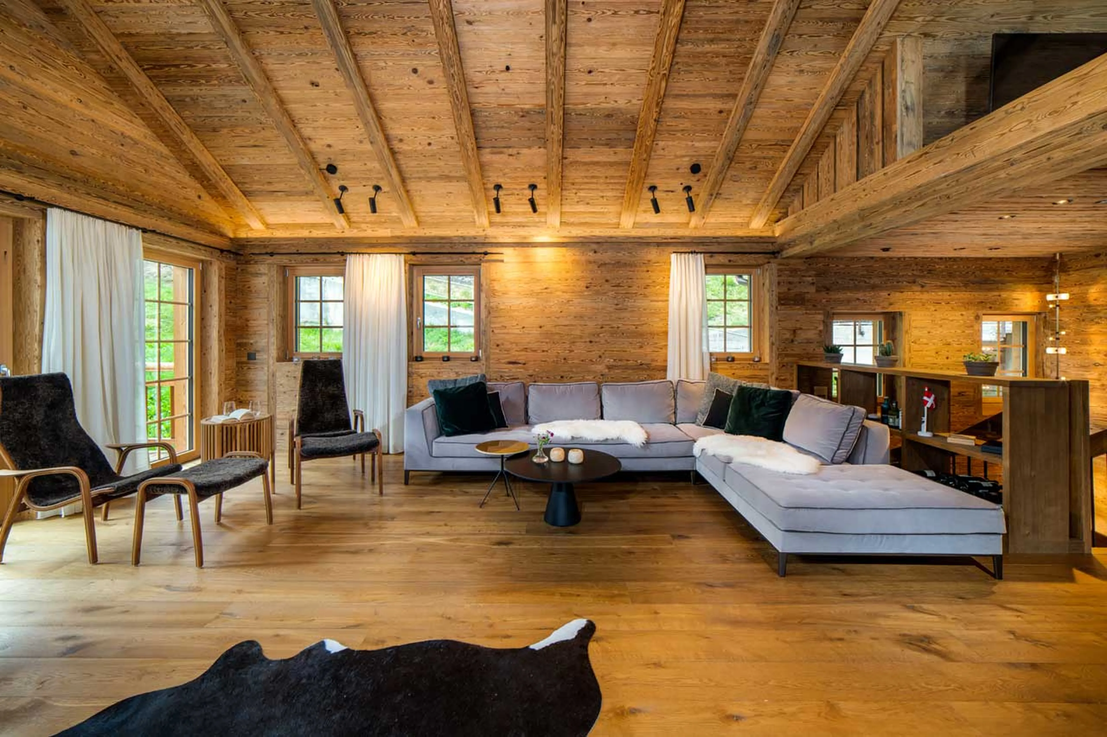 Sofas in living area of Chalet Simon in Saas Fee