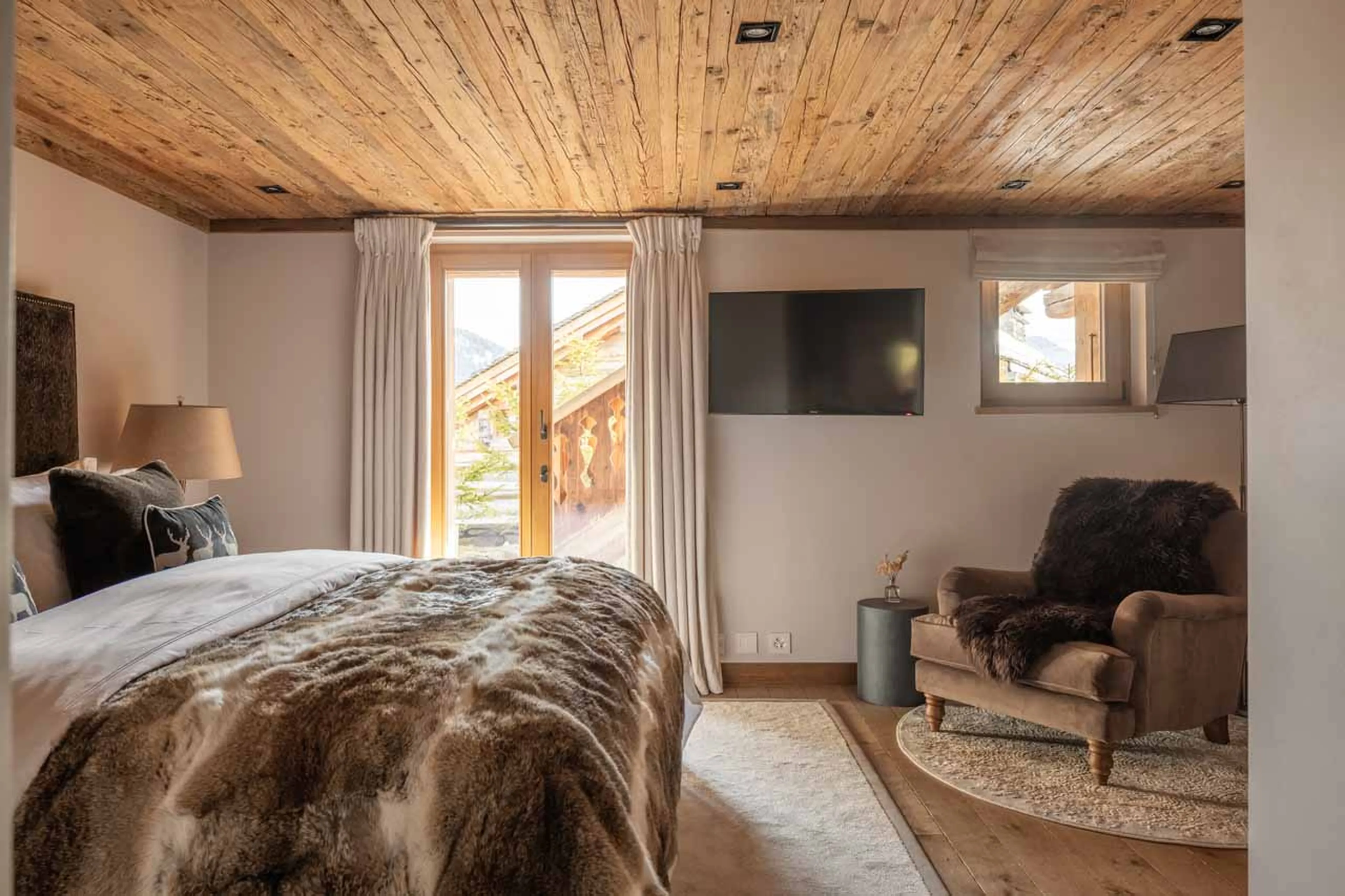 Access to terrace from master bedroom in Chalet Sirocco in Verbier