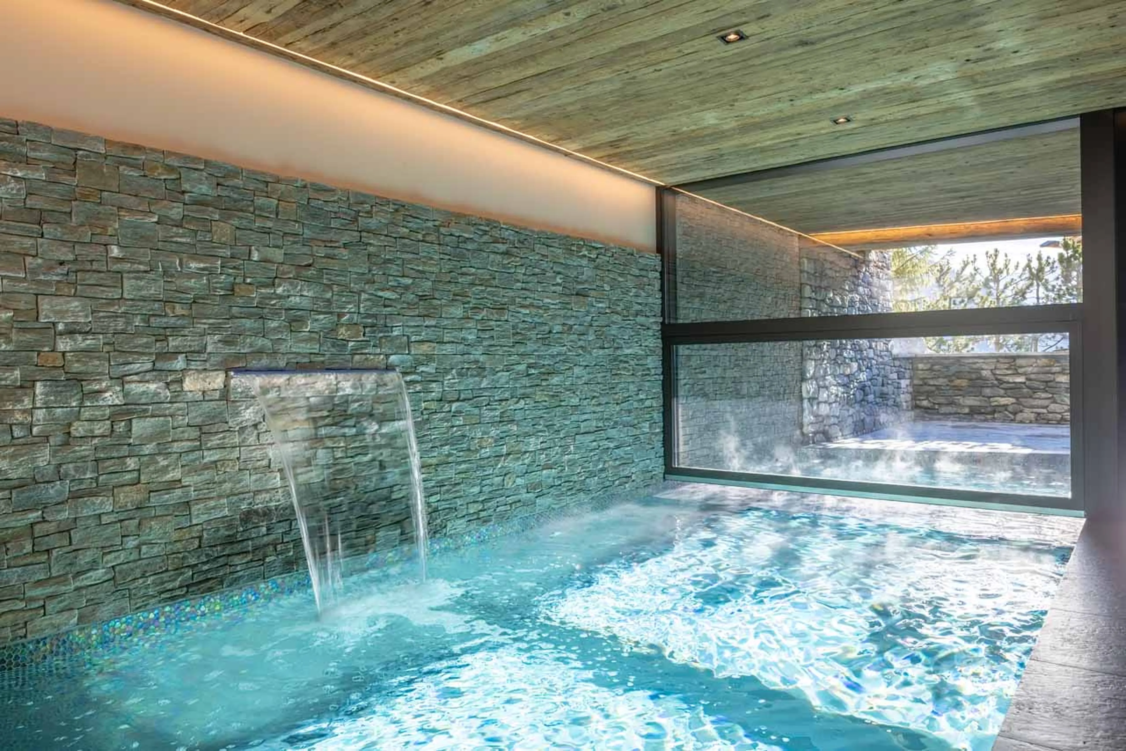 Indoor hot tub at Alpine Estate in Verbier