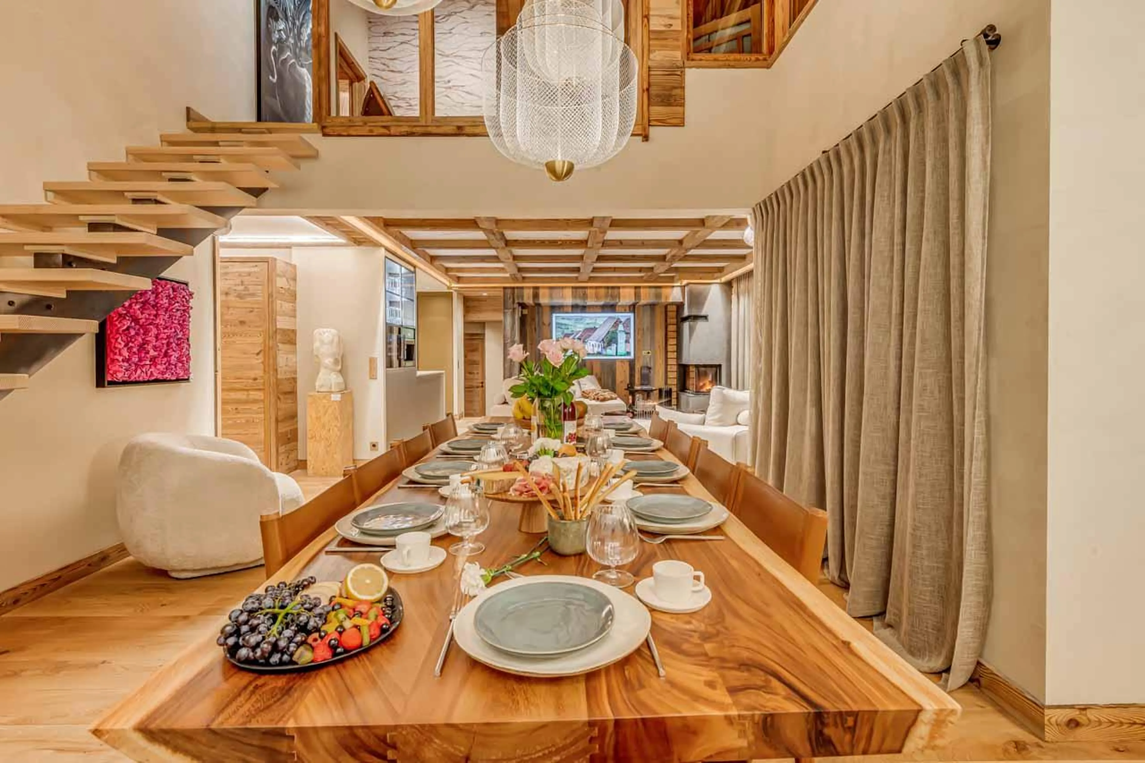 Dining table and staircase in Chalet Sneg, Tignes
