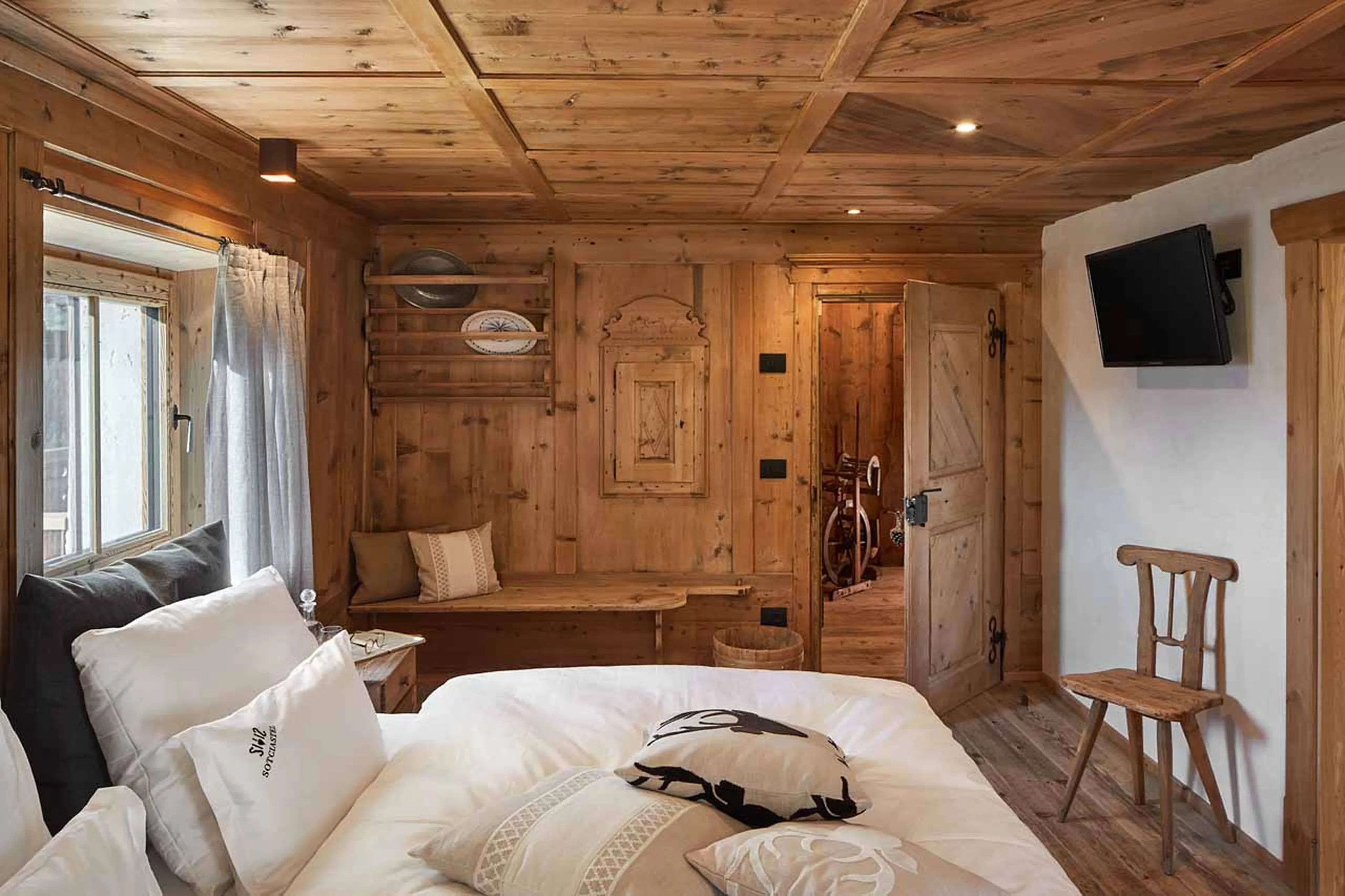 TV in bedroom two at Chalet Sotciastel in Alta Badia