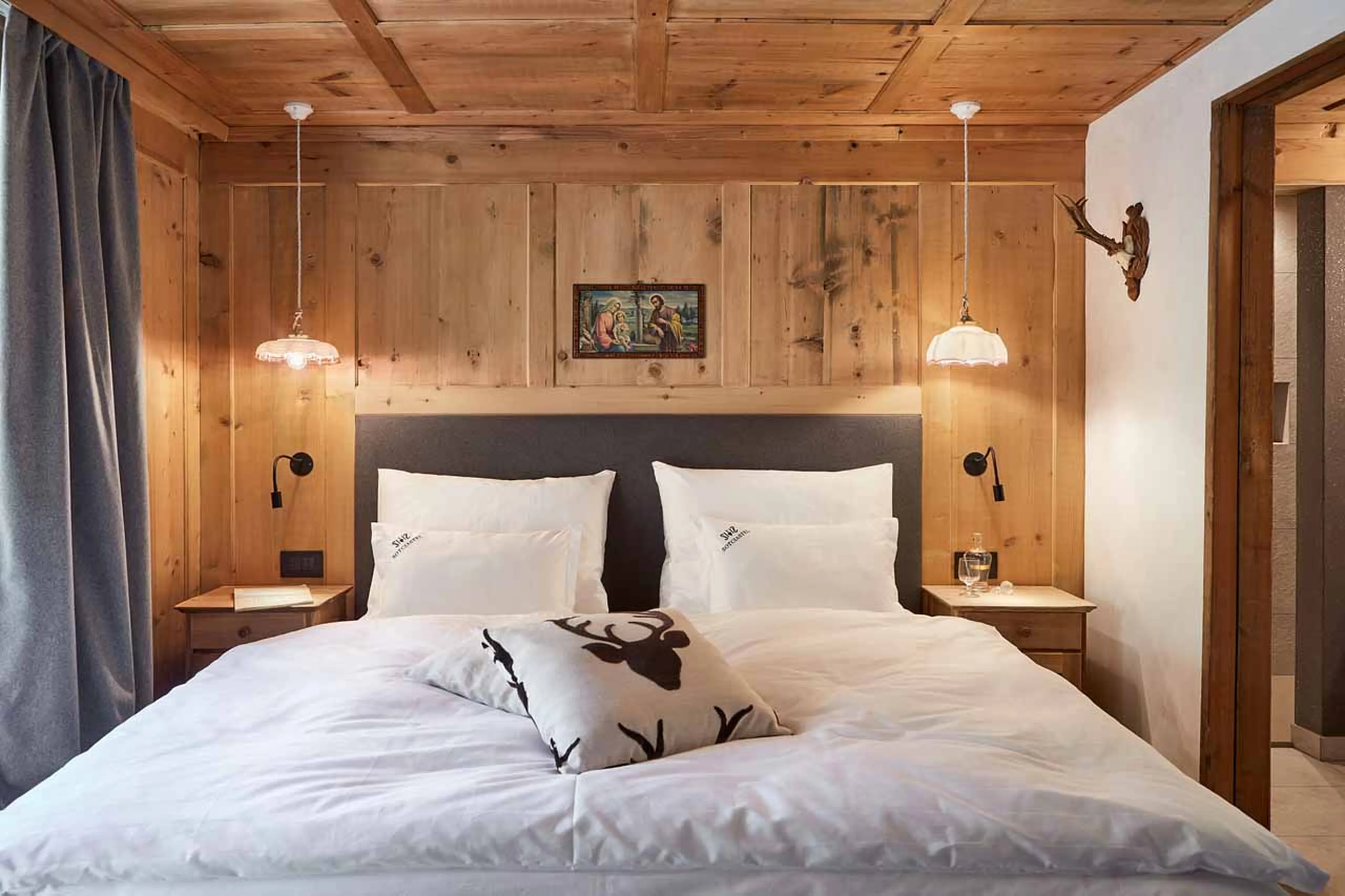Bedroom three at Chalet Sotciastel in Alta Badia