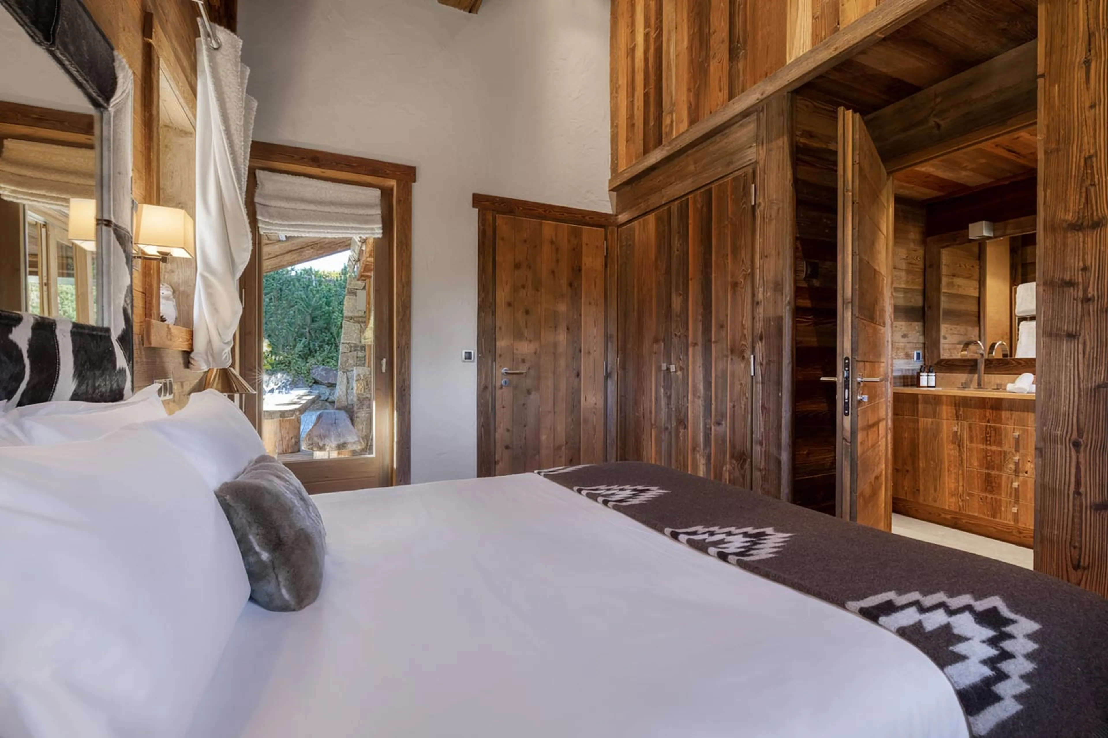 En-suite shower room and access to balcony at Chalet Talland in Megeve