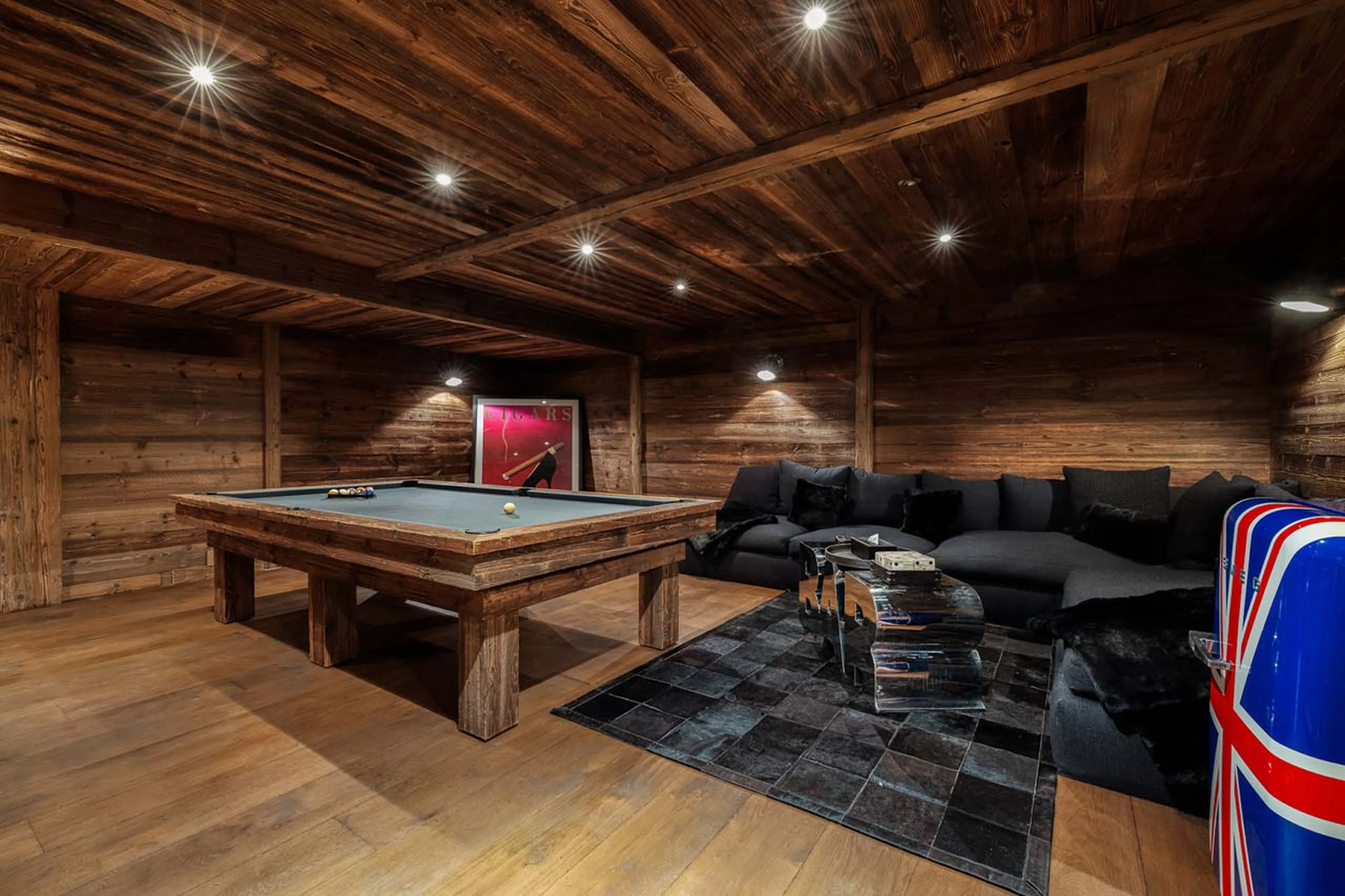Pool table in TV room in Chalet Talland in Megeve