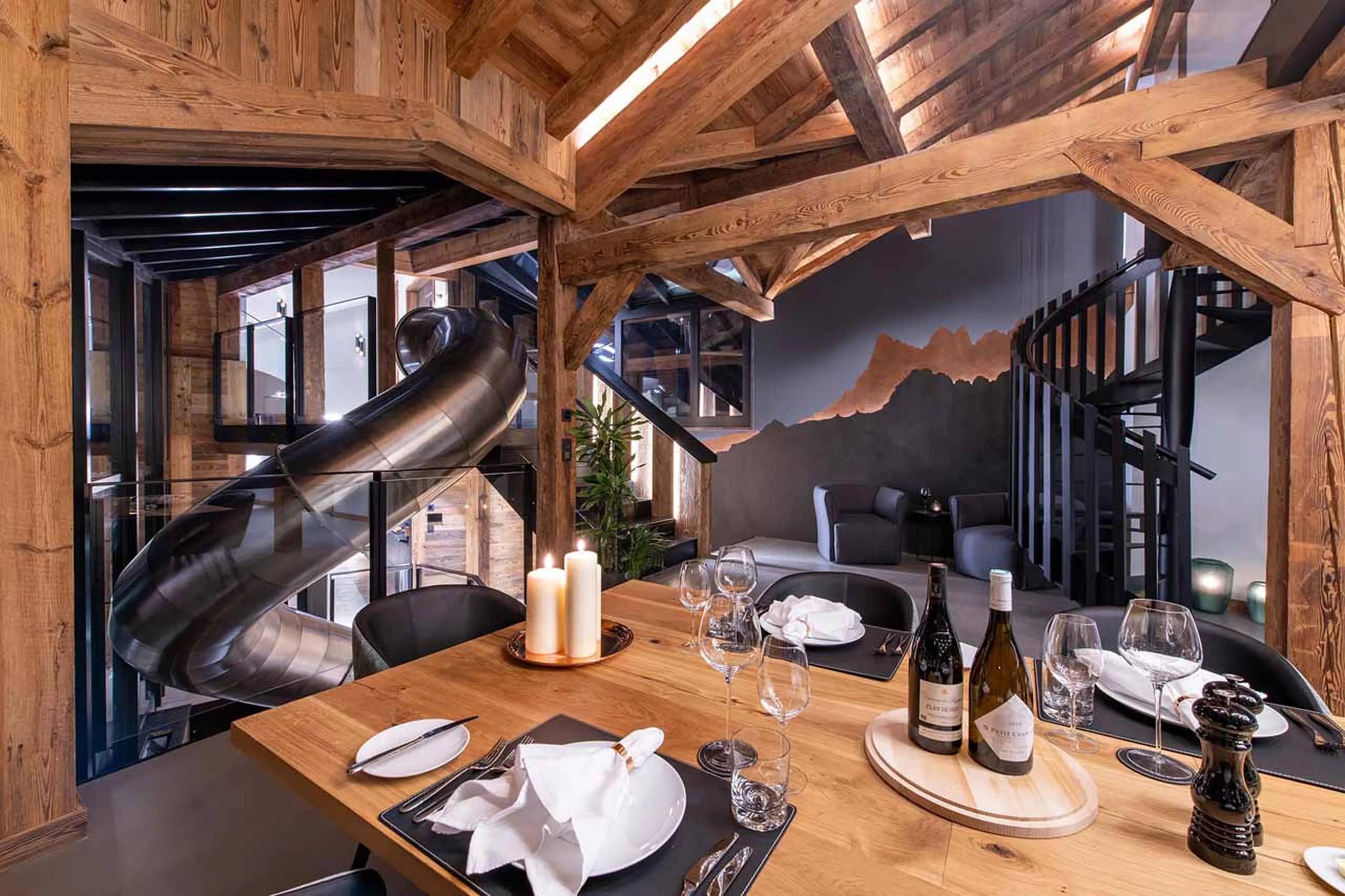 Dining table and slide at Chalet Tataali in Morzine