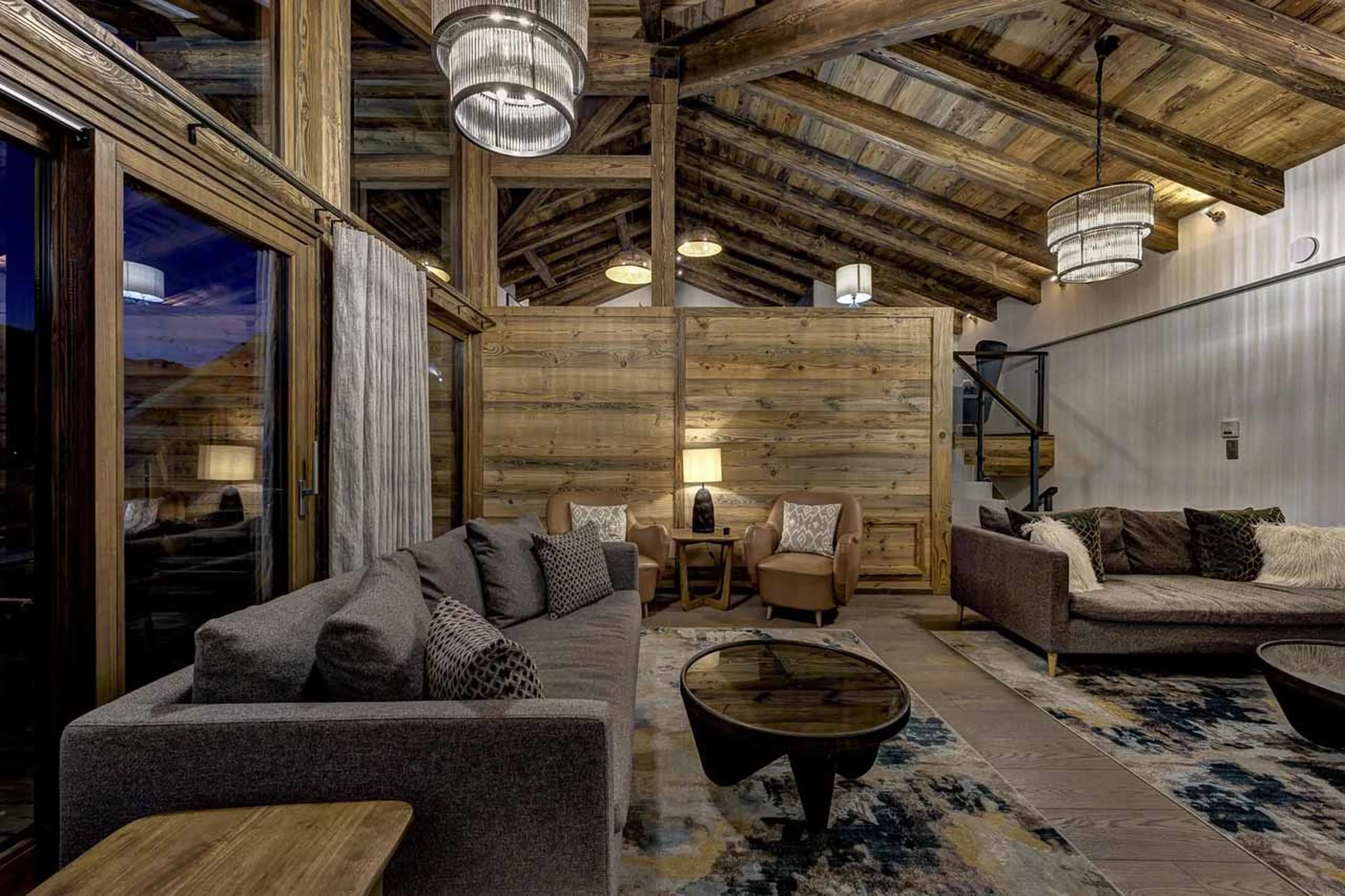 Living room at night in Chalet Three Bears in Morzine