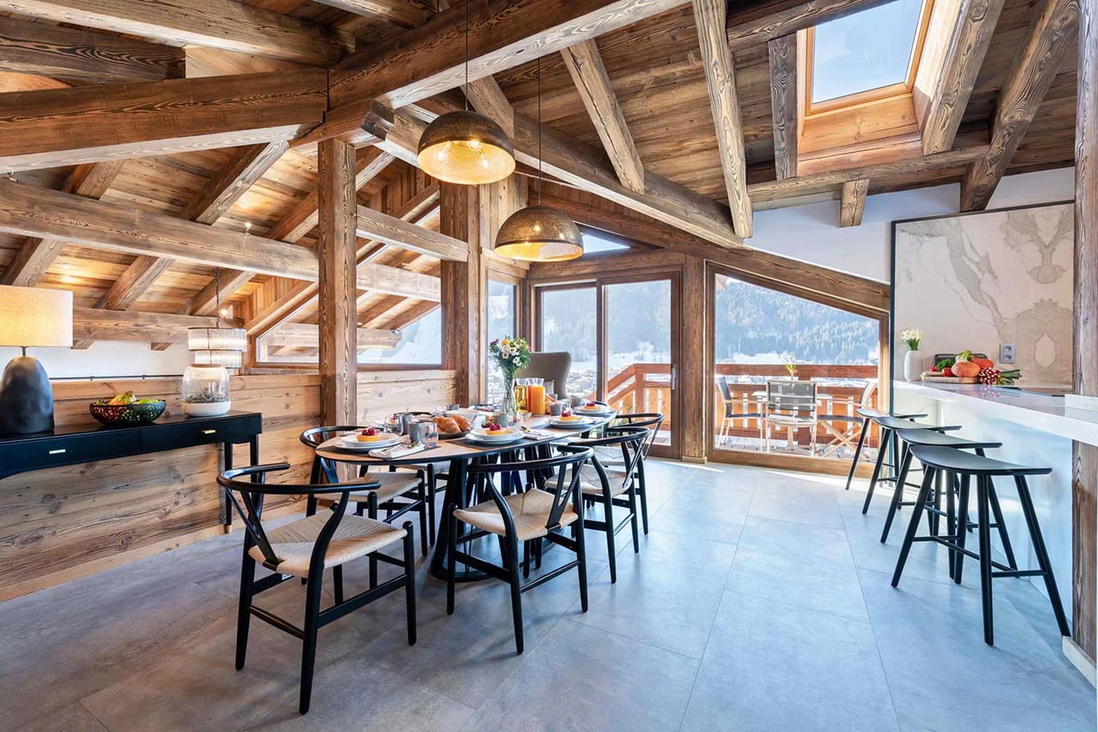 Dining area and balcony at Chalet Three Bears in Morzine