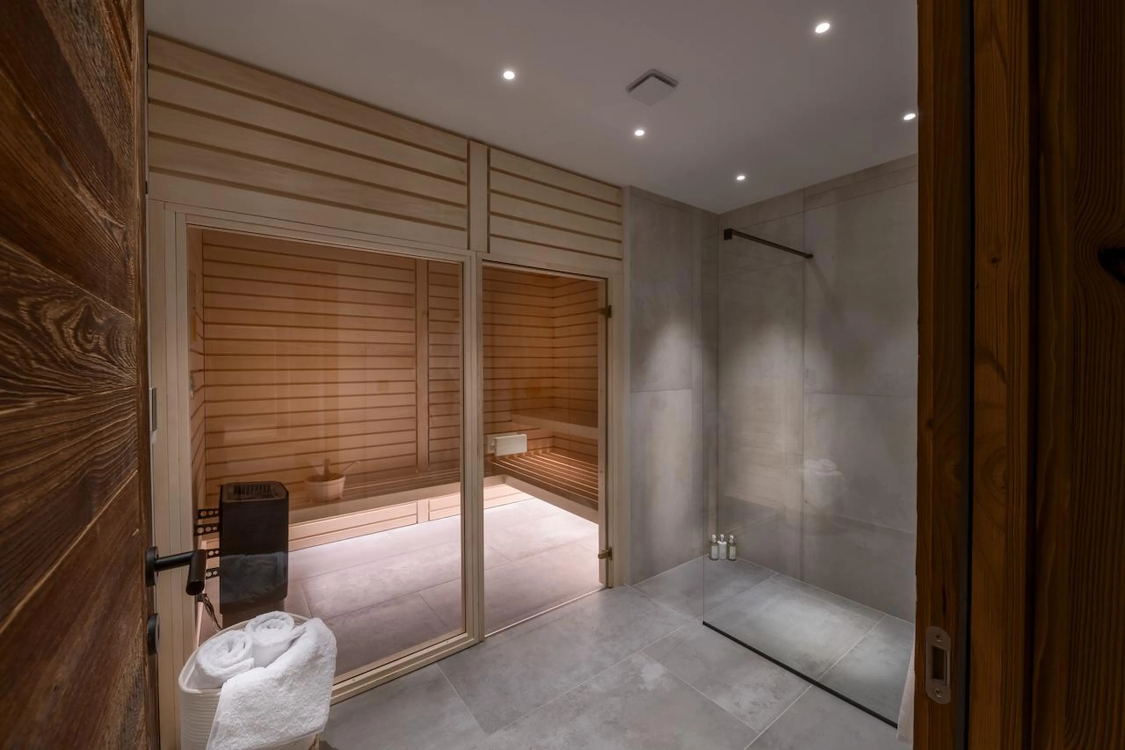 Wellness area with shower and sauna at Chalet Tosca in Les Gets