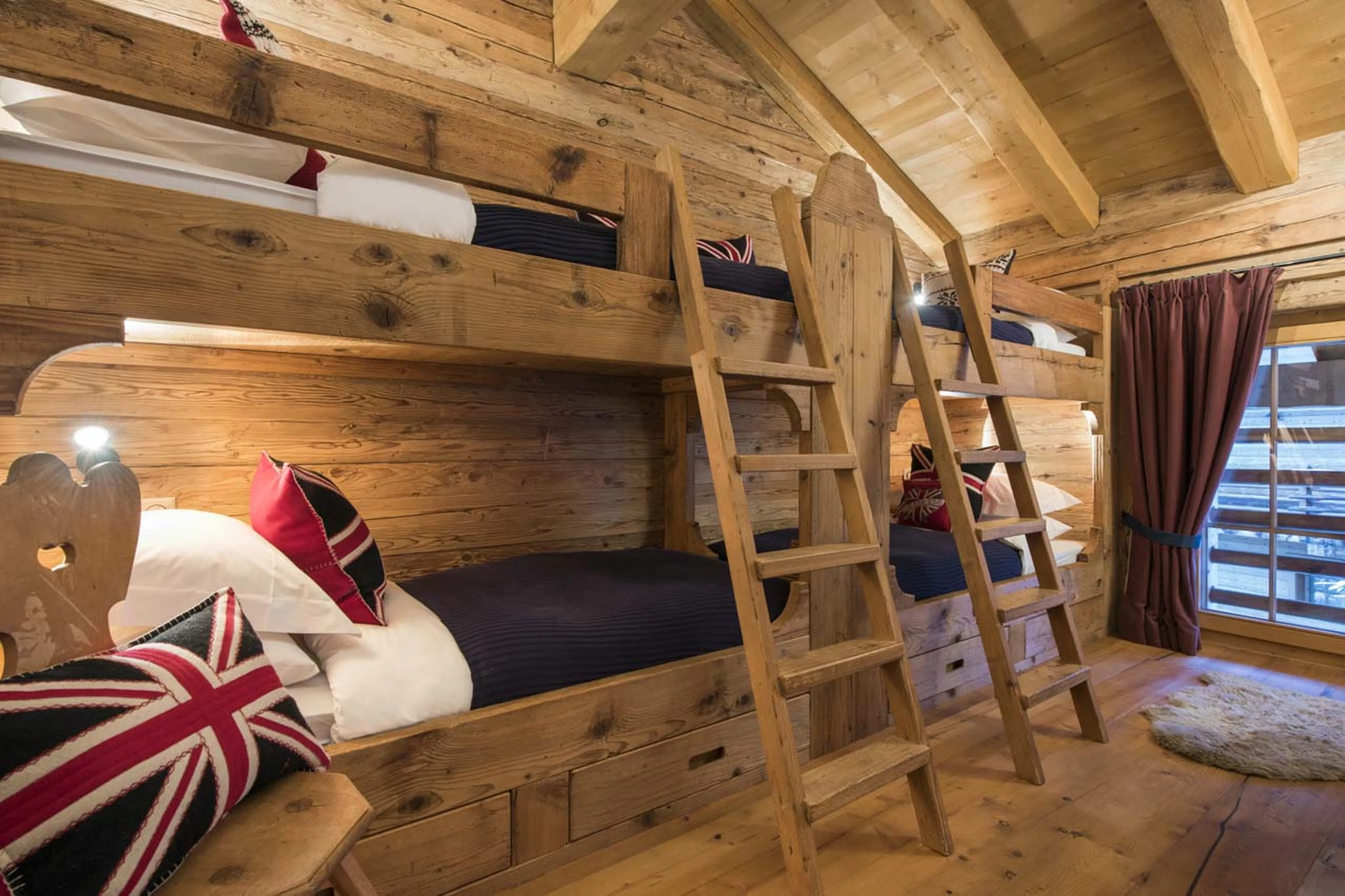 Quad bunk bedroom at Penthouse Treize Etoiles in Verbier