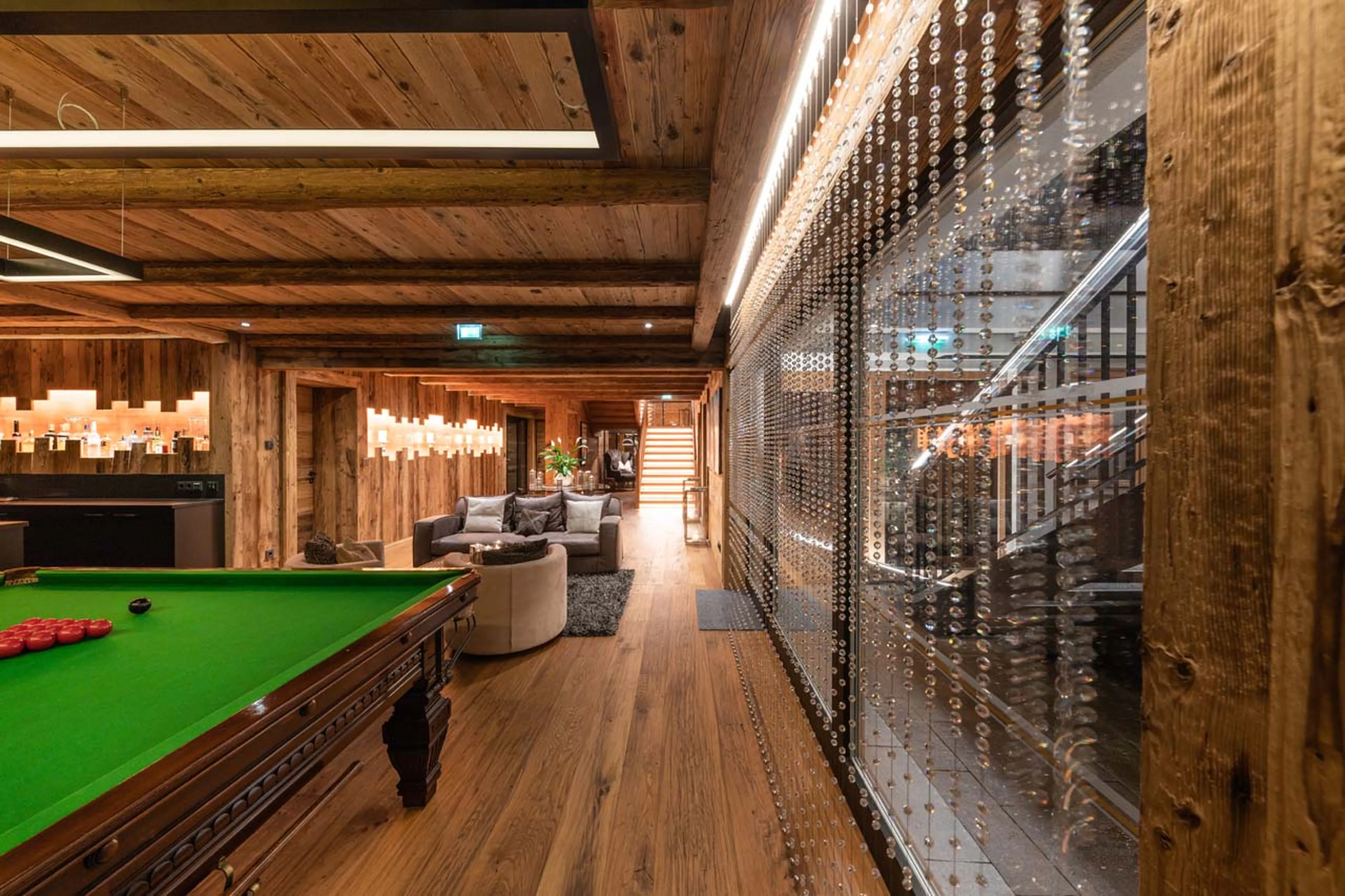 Seating in entertainment area at Chalet Uberhaus in Lech