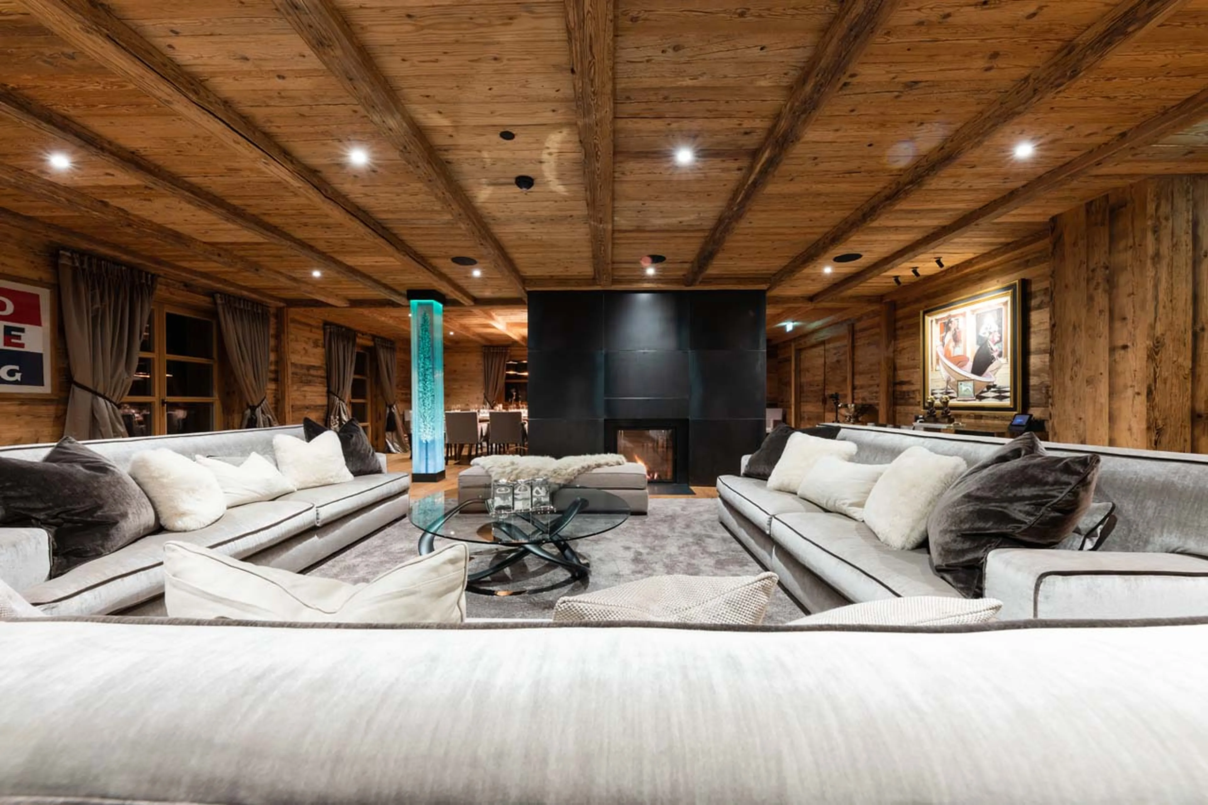 Fireplace in living area at Chalet Uberhaus in Lech