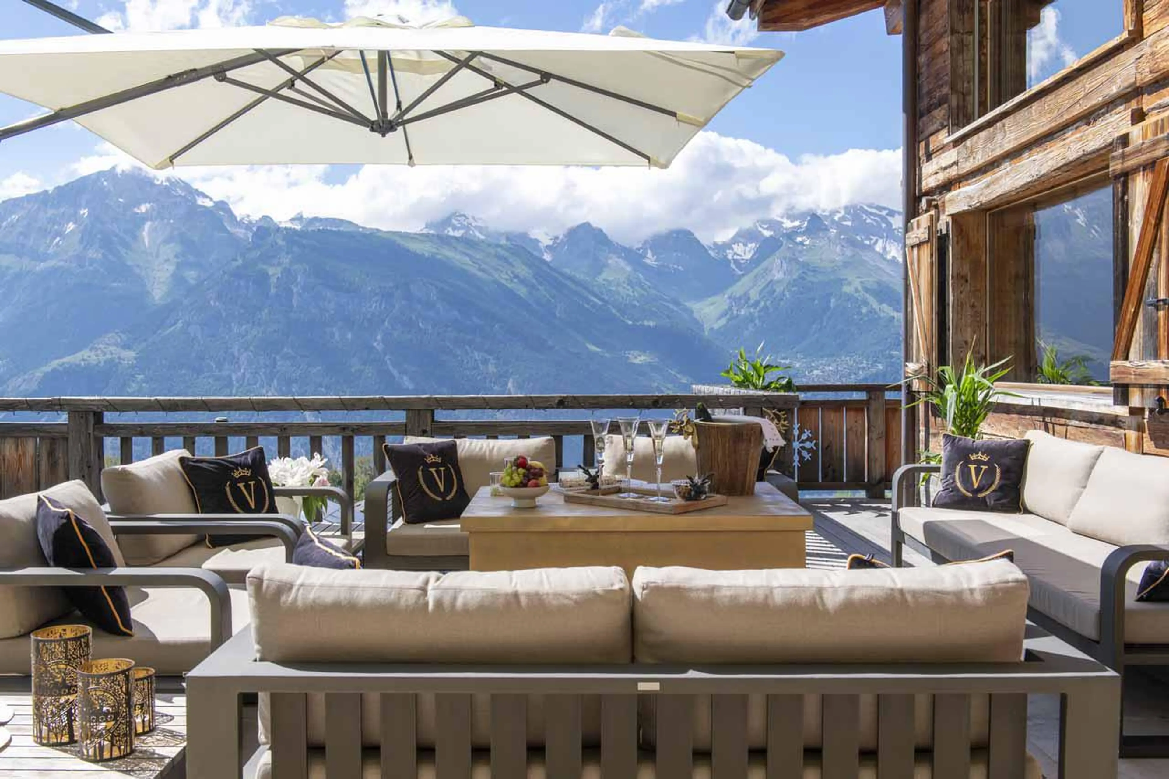 Terrace with fire pit at Chalet V in La Tzoumaz