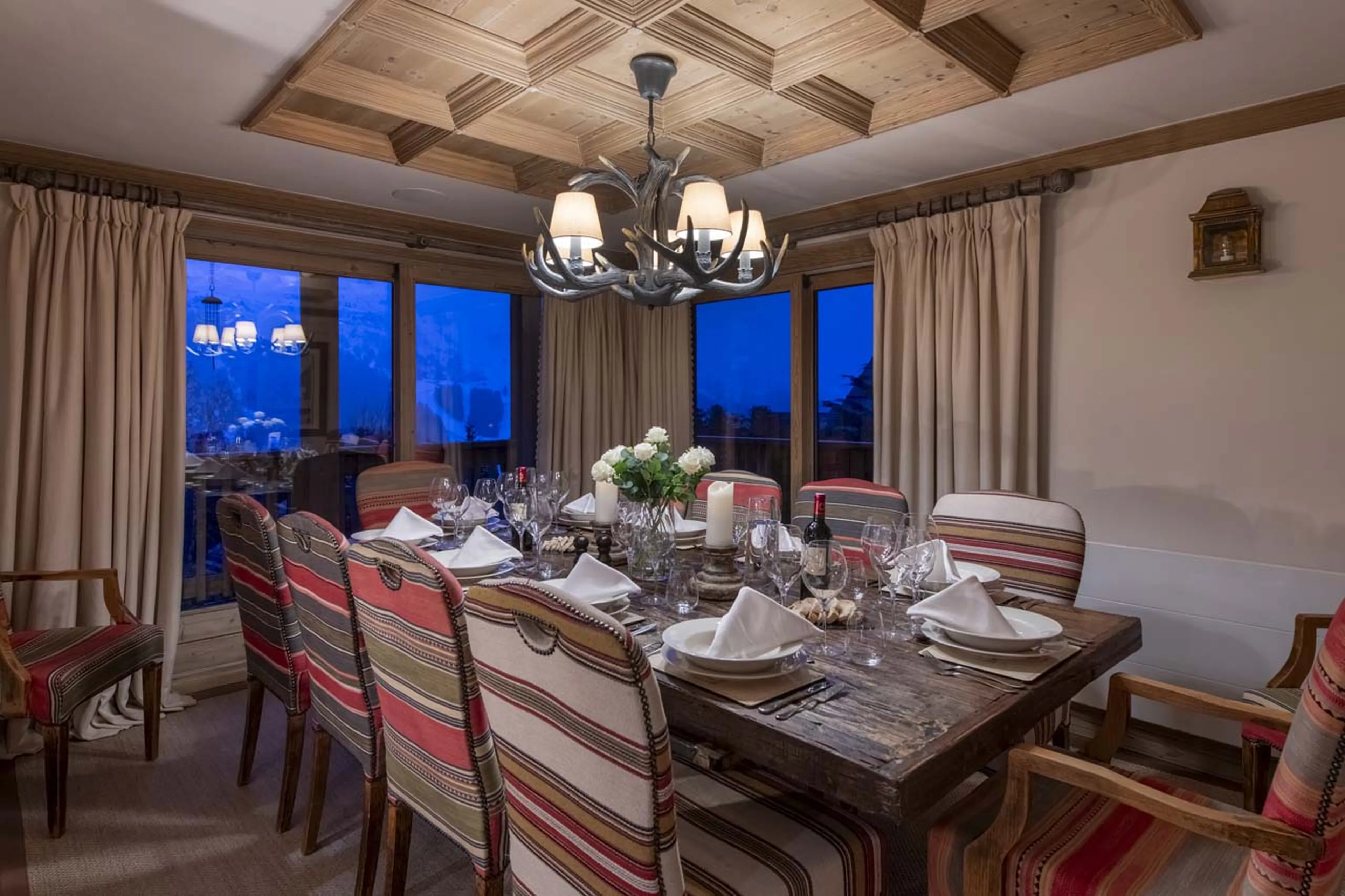 Dining room at night in Chalet Valentine in Meribel