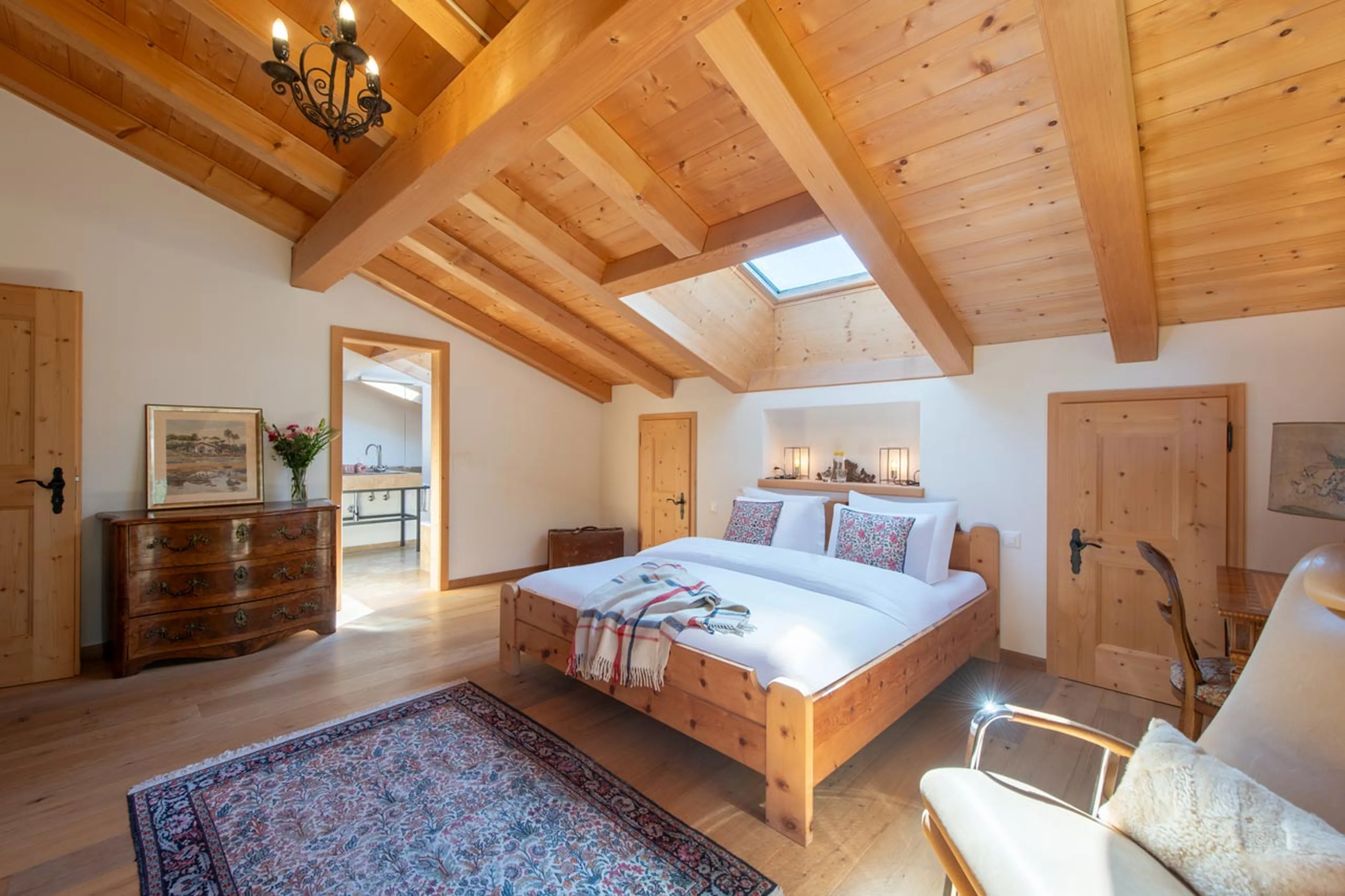 Bed in bedroom two at Chalet Verbena in Klosters