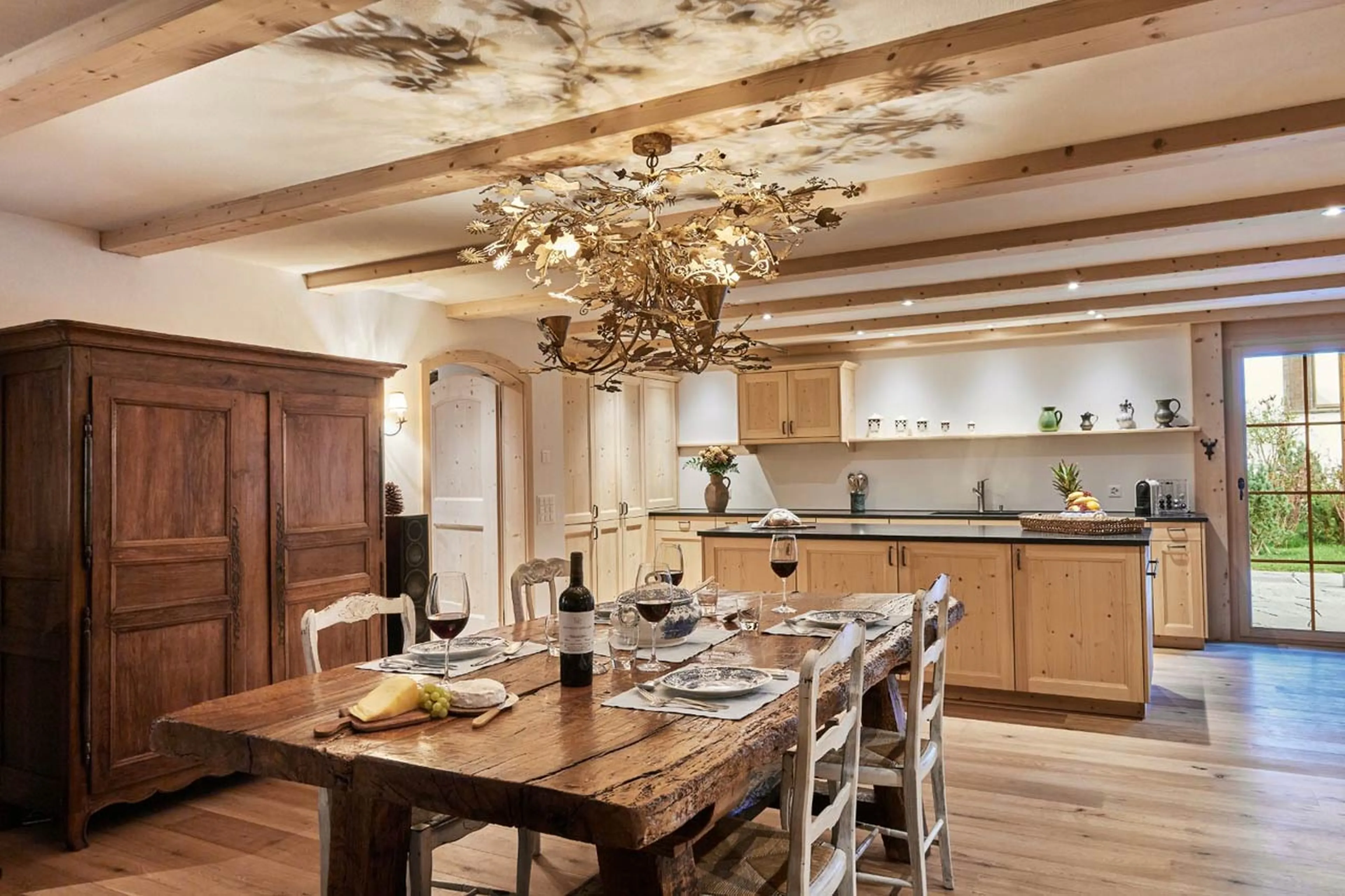 Dining room and kitchen at Chalet Verbena in Klosters