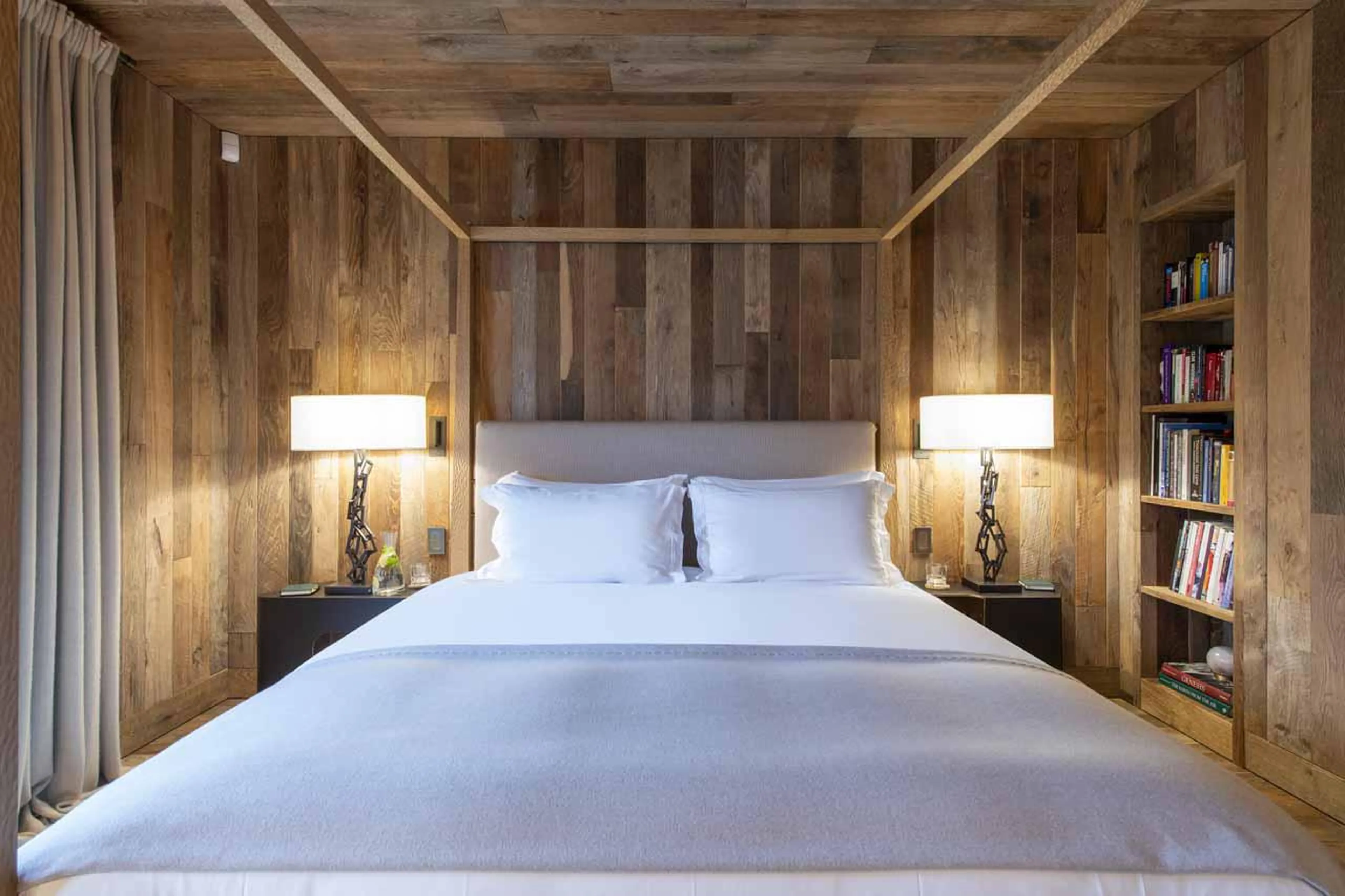 Double bedroom with traditional chalet feel at Chalet Vicuna in Verbier