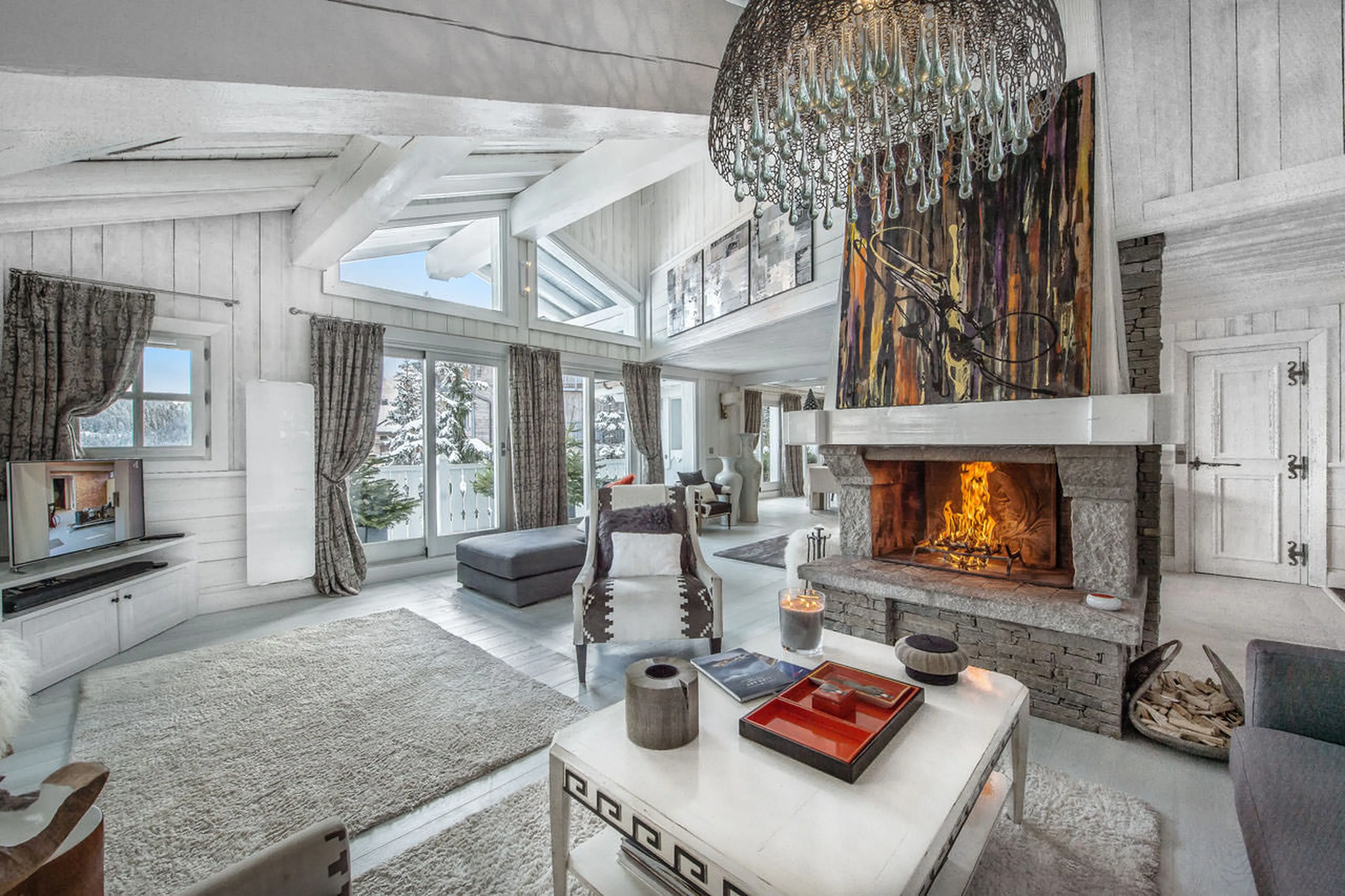 Large living room with fireplace in Chalet White Dream in Courchevel 1850