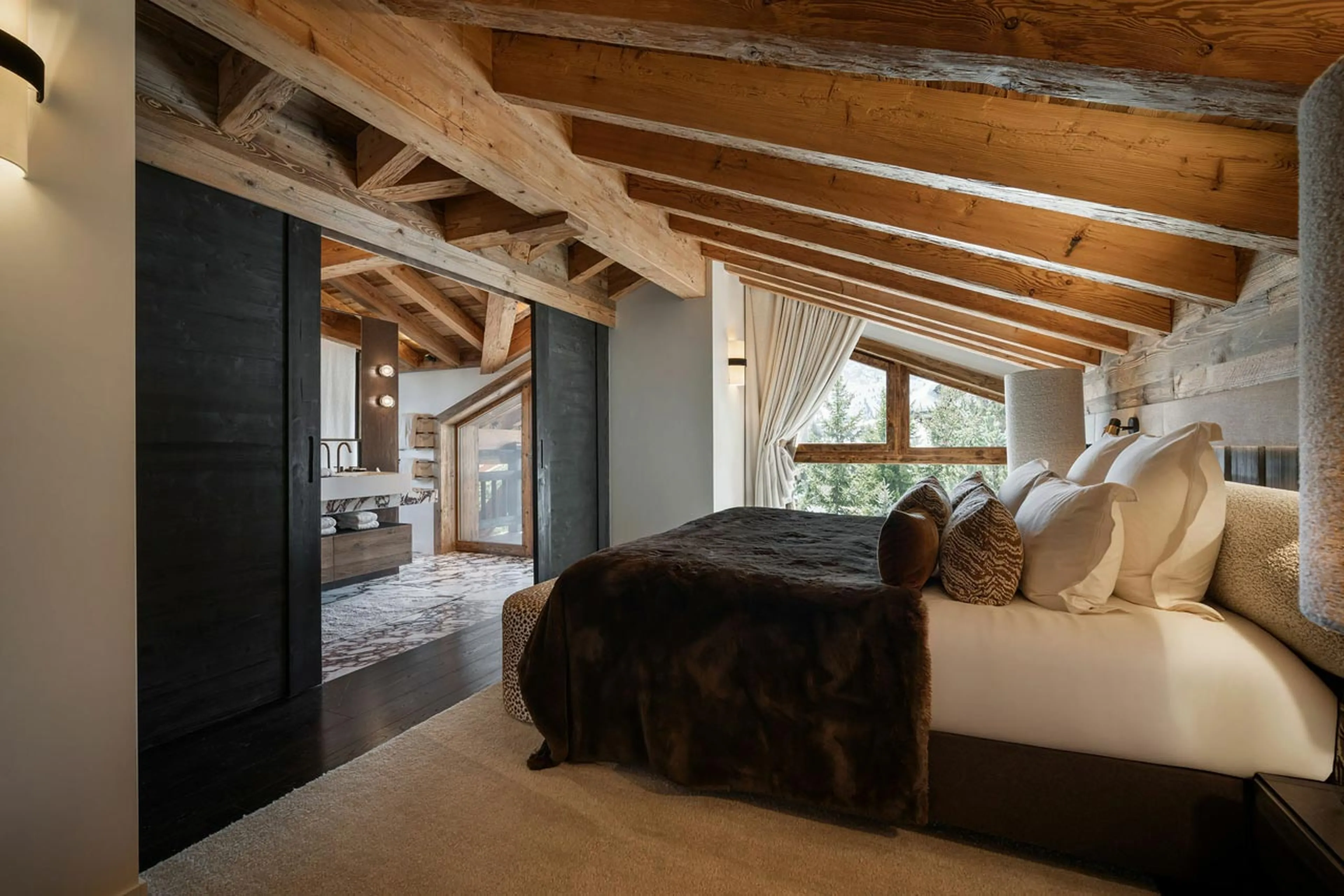 Master bed at Chalet Yin & Yang in Courchevel 1850