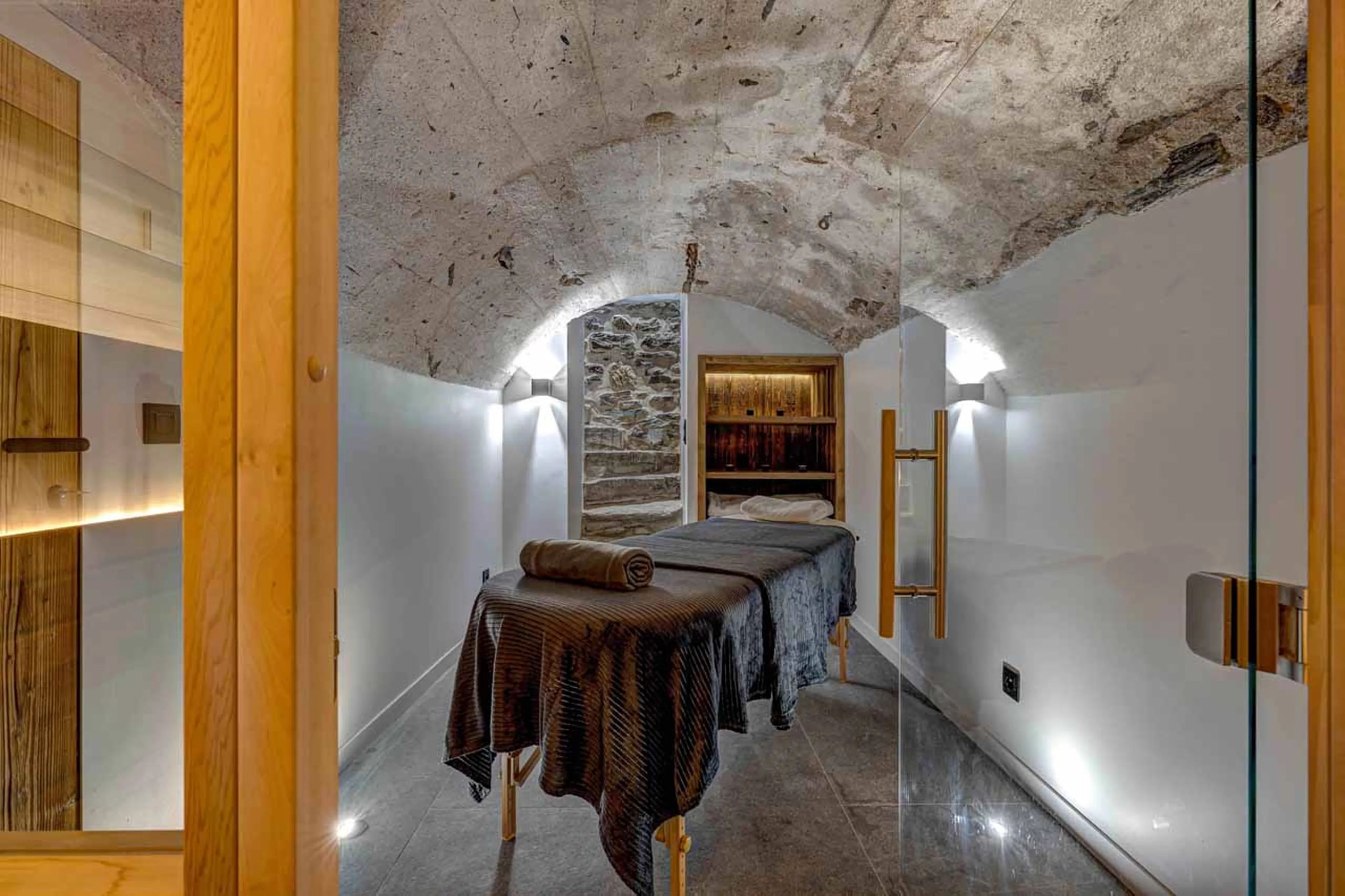 Wellness area with massage table  in Chalet Zanskar, St Martin de Belleville