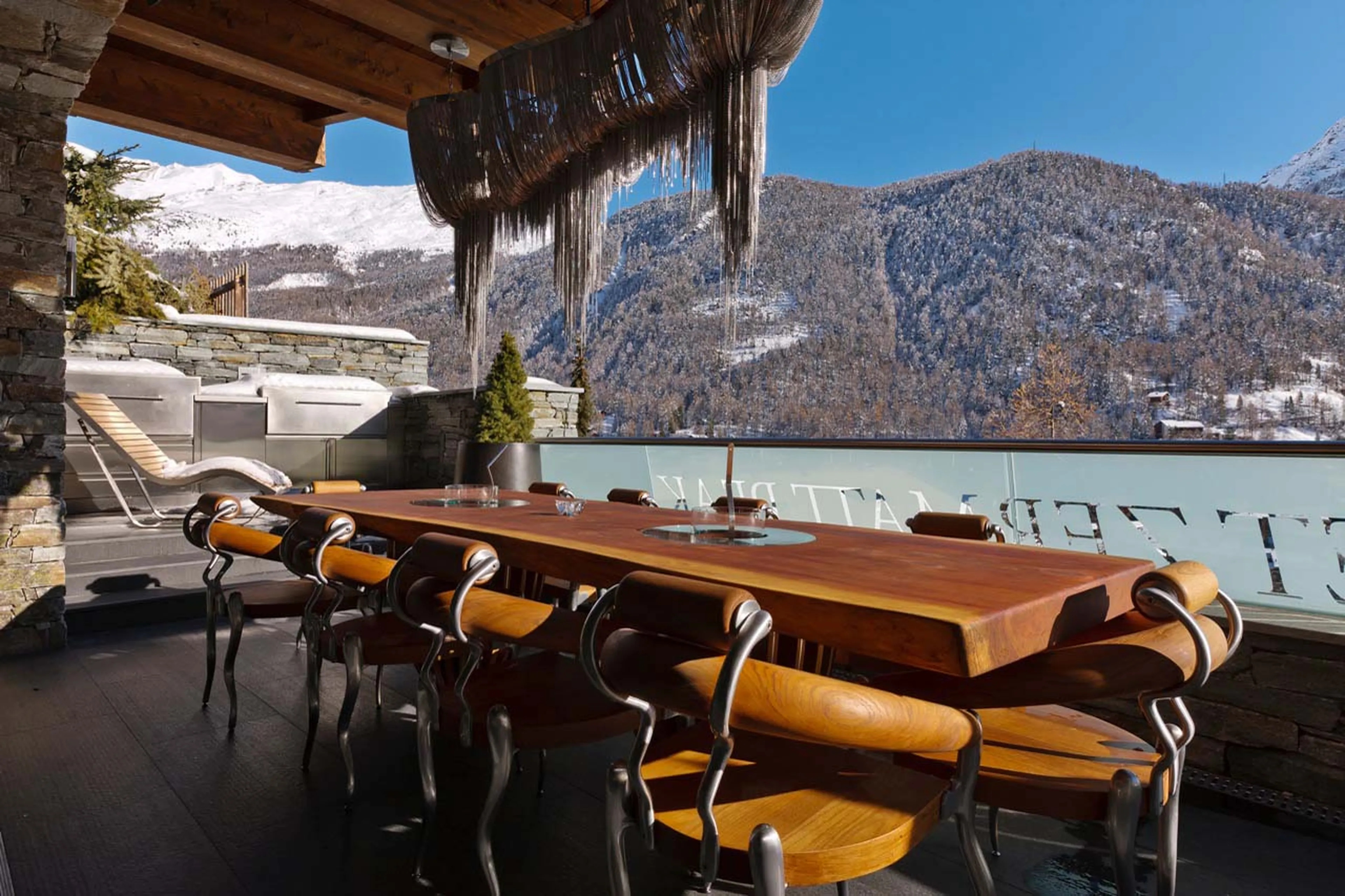 Al fresco dining on terrace of Chalet Zermatt Peak in Zermatt
