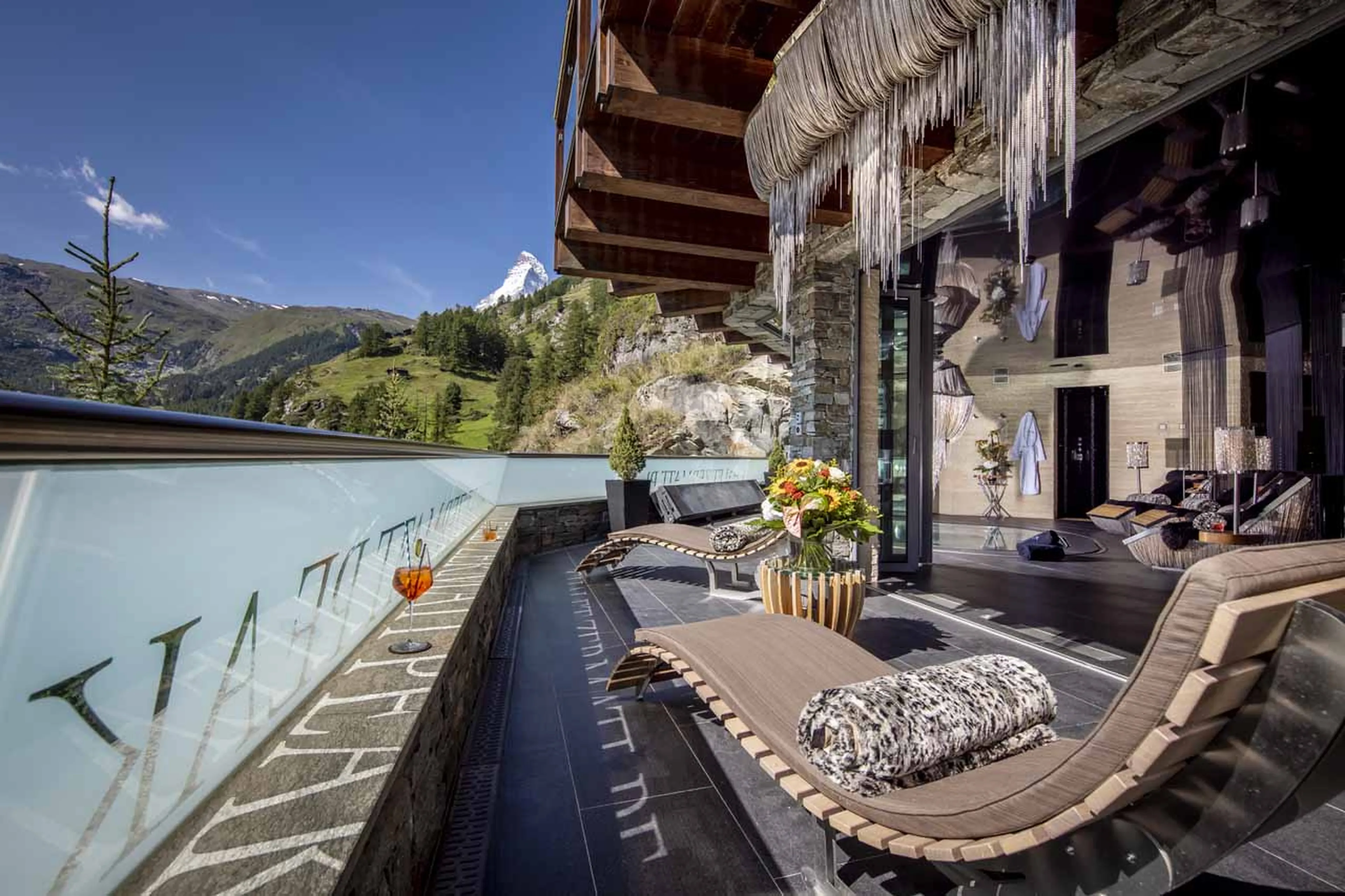 Spa terrace at Chalet Zermatt Peak in summer