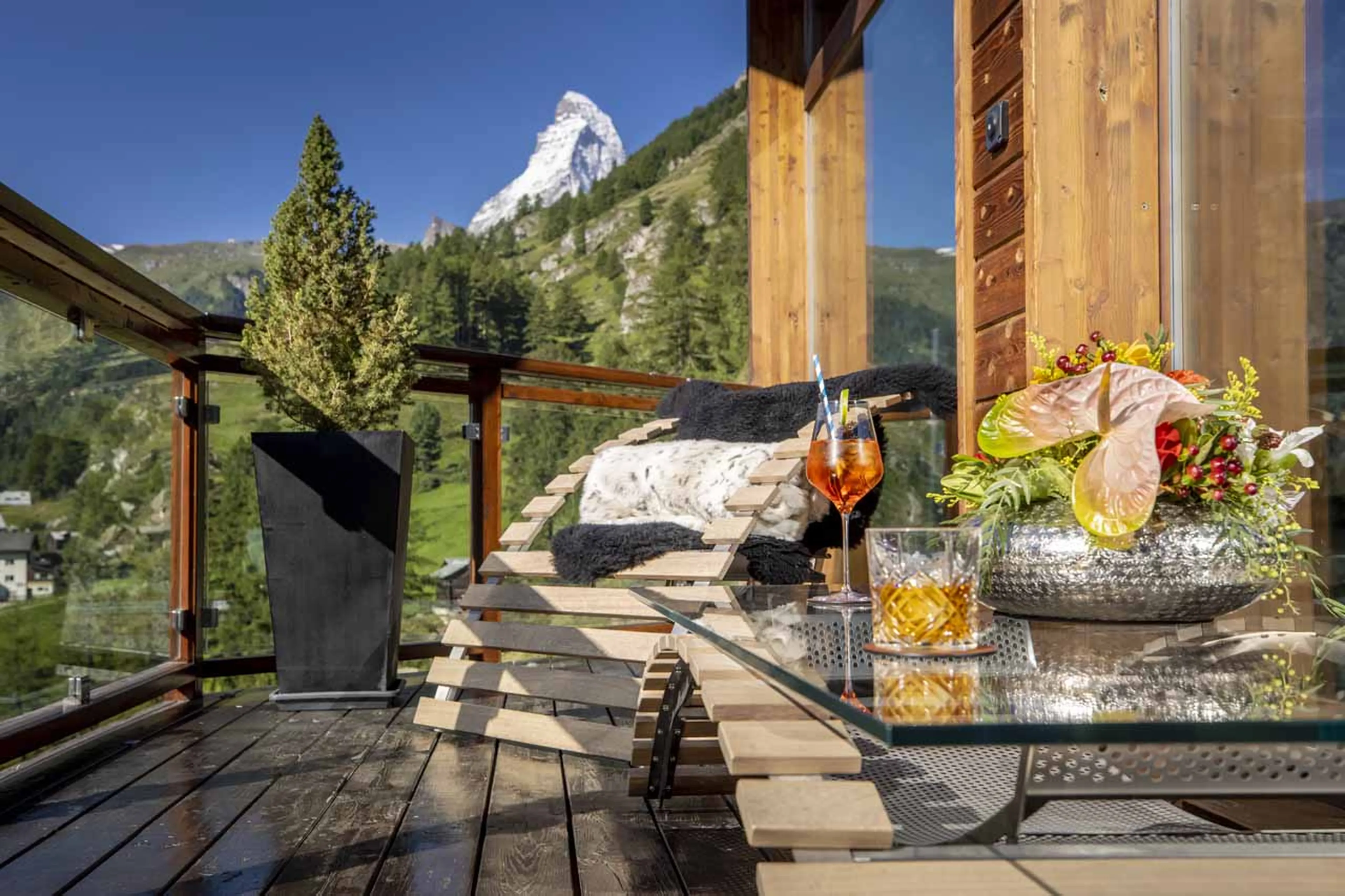 Aperol Spritz on terrace in summer at Chalet Zermatt Peak