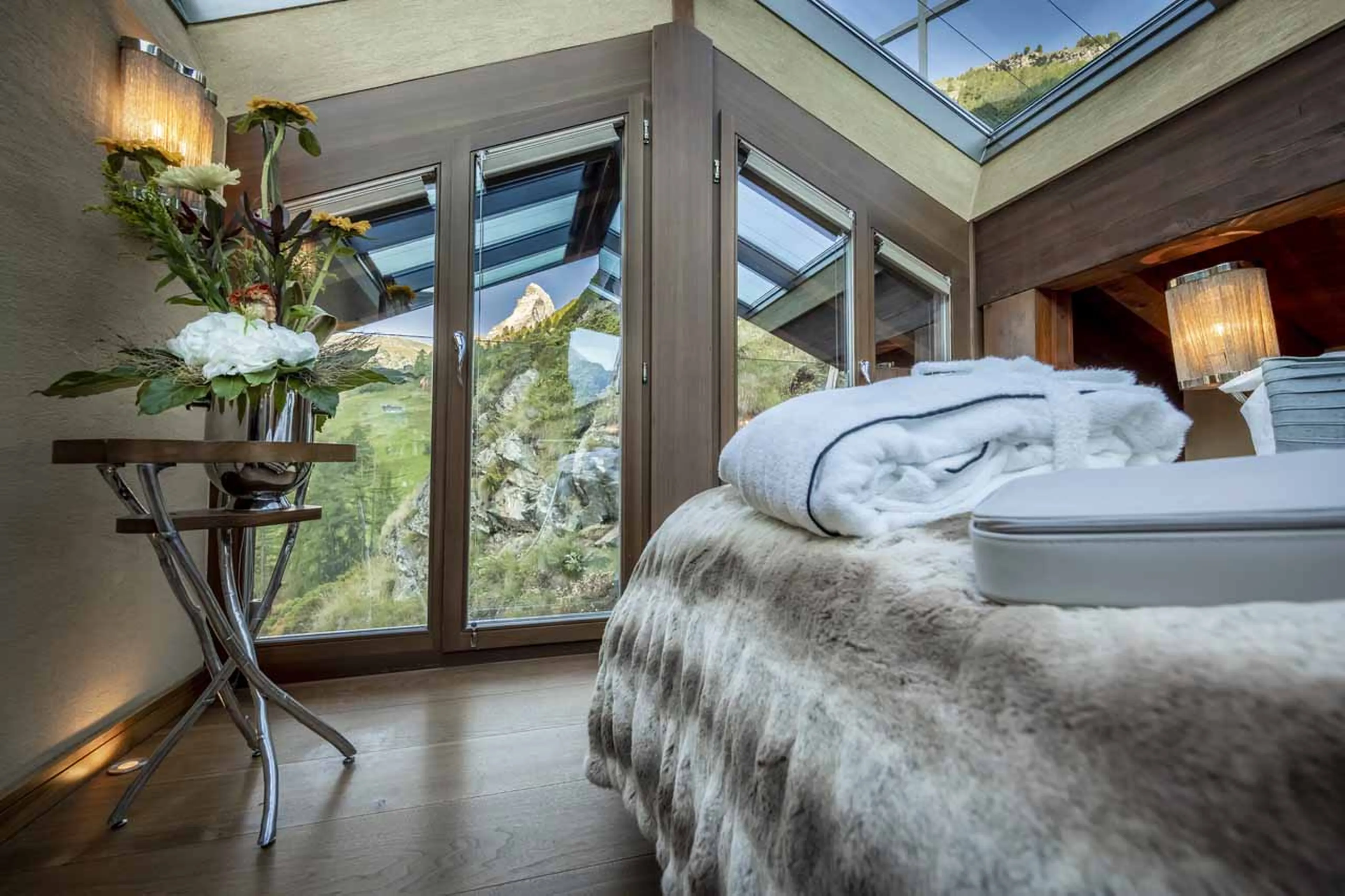 Matterhorn view from bed at Chalet Zermatt Peak in summer