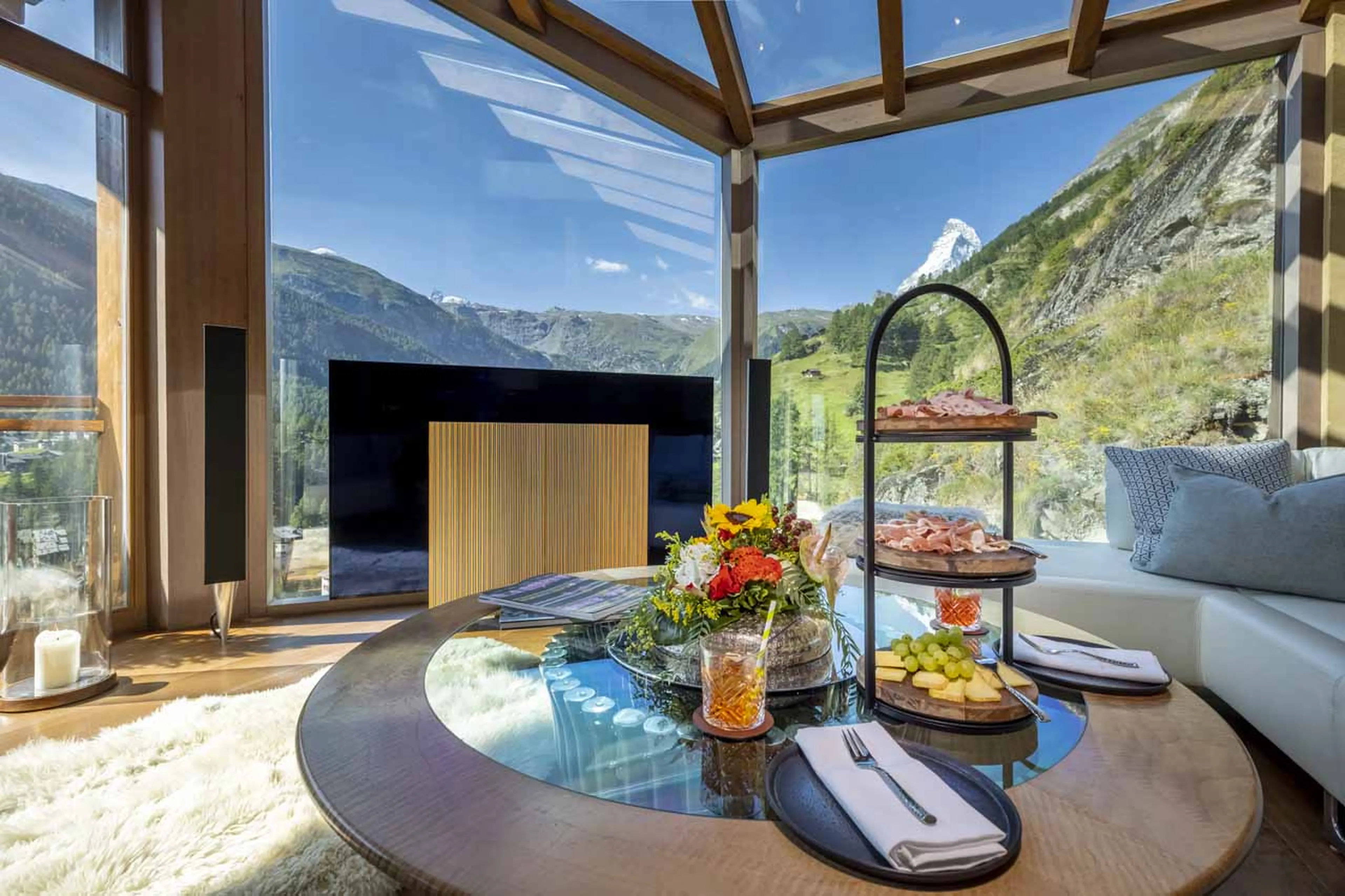 Afternoon tea with view of Matterhorn at Chalet Zermatt Peak in summer