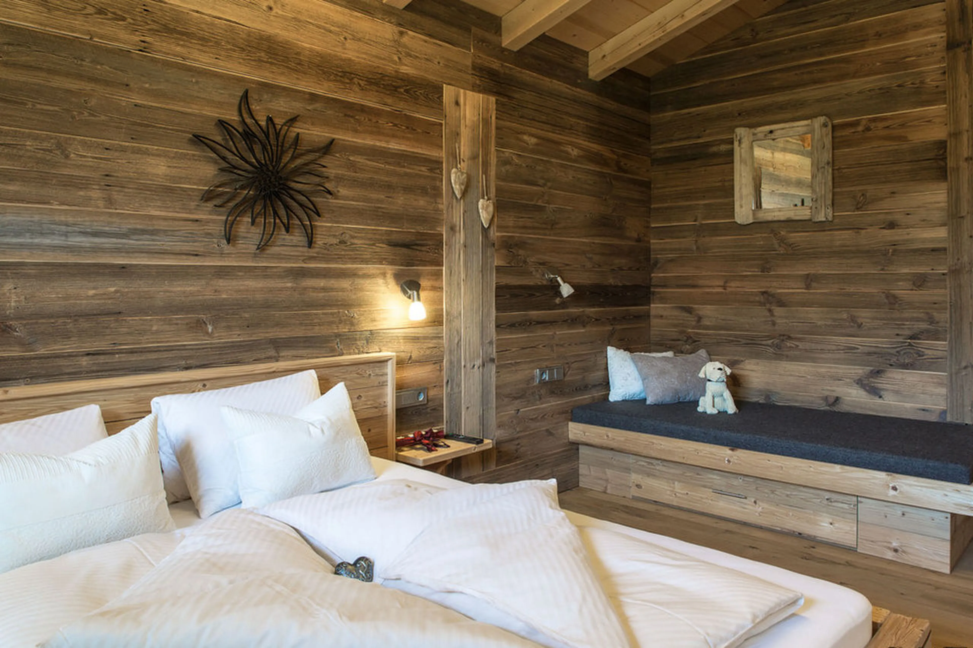 Family bedroom with double, single bed and shared shower room in Chalet Ziller in Zillertal