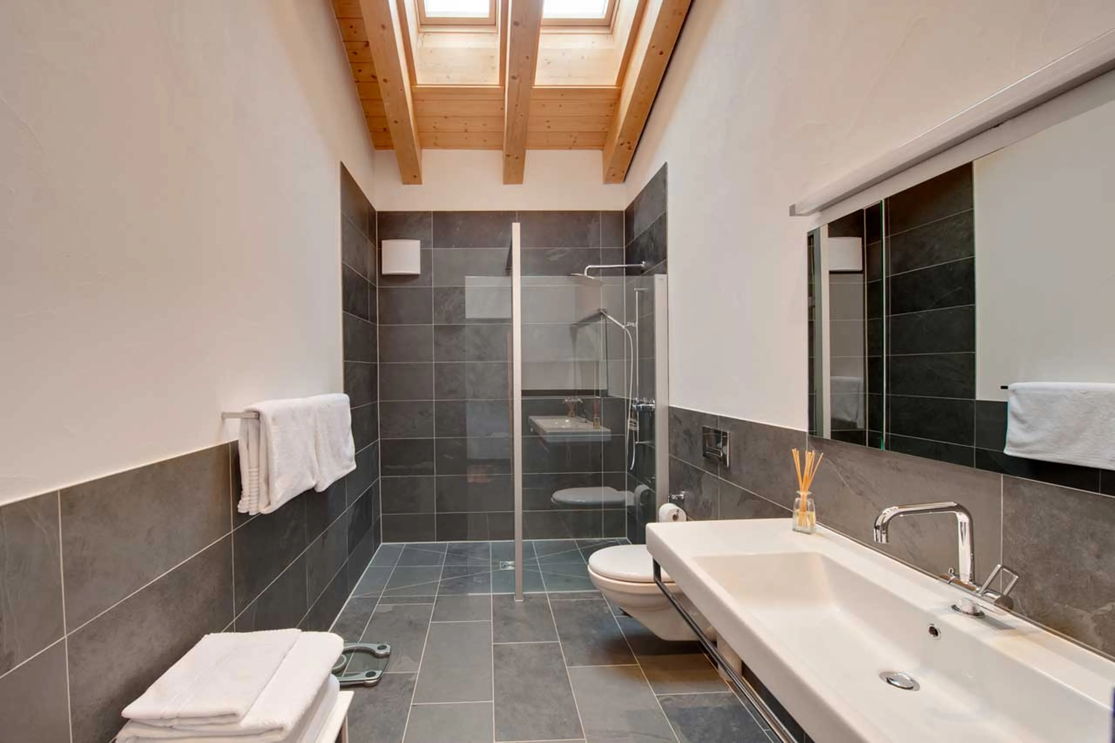 Bathroom one at Chalet Zora in Zermatt