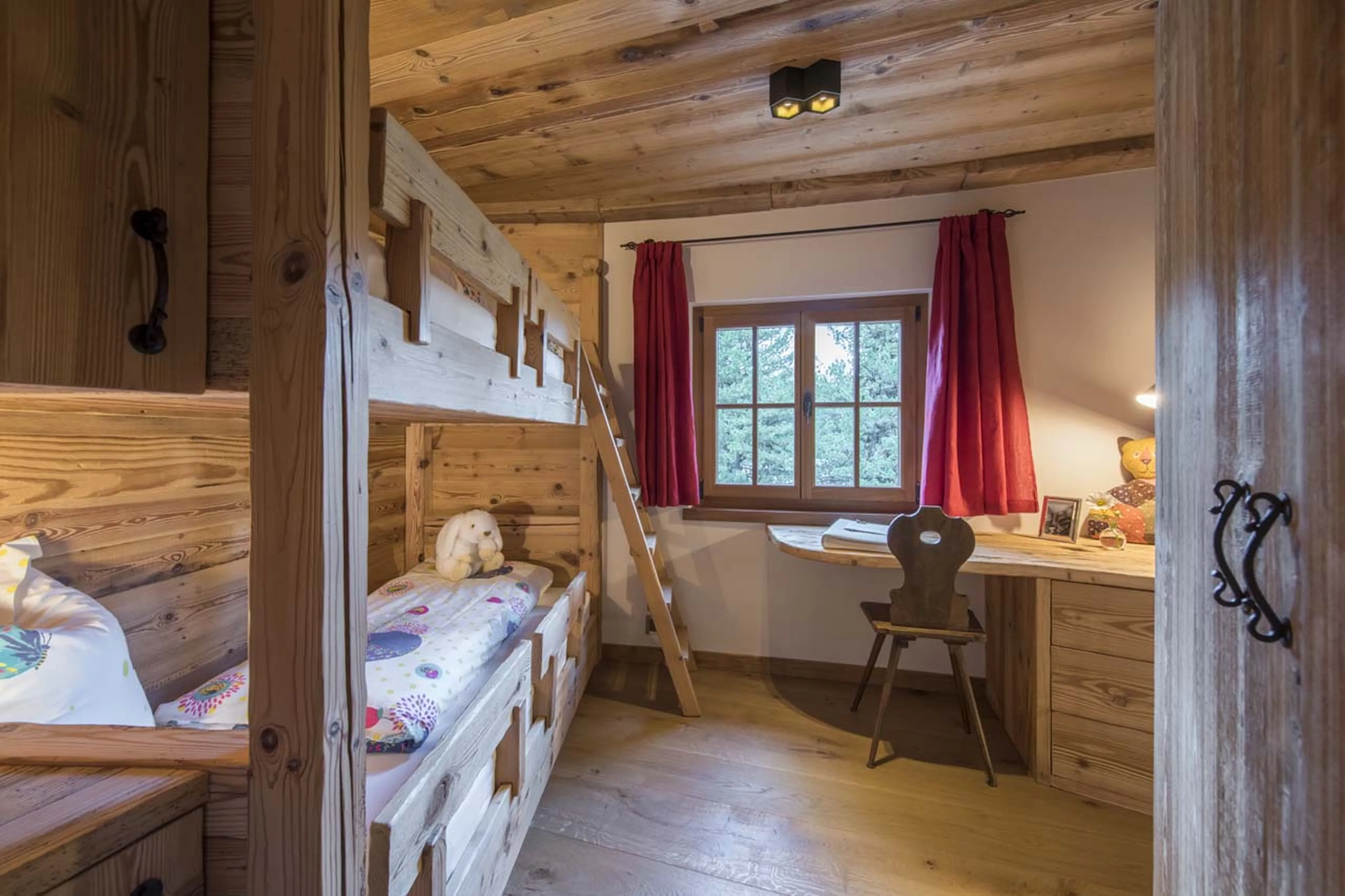 Bunk beds in bedroom six at Chesa El Toula in St Moritz