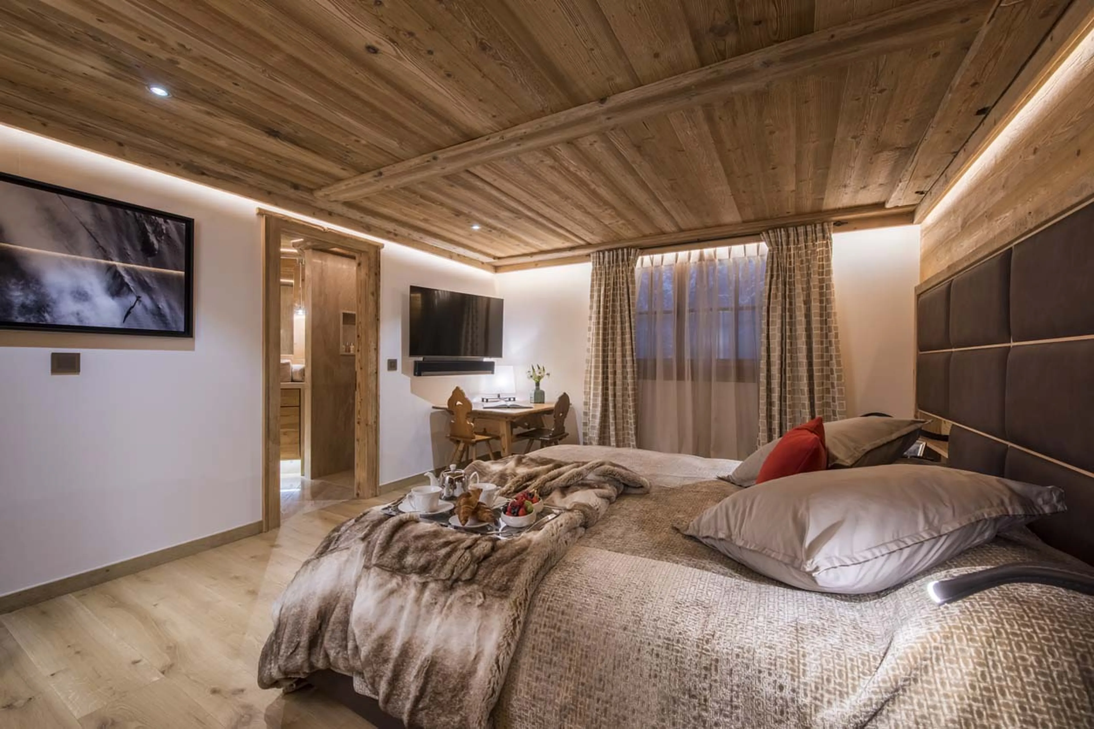 Bedroom four with TV at Chesa El Toula in St Moritz