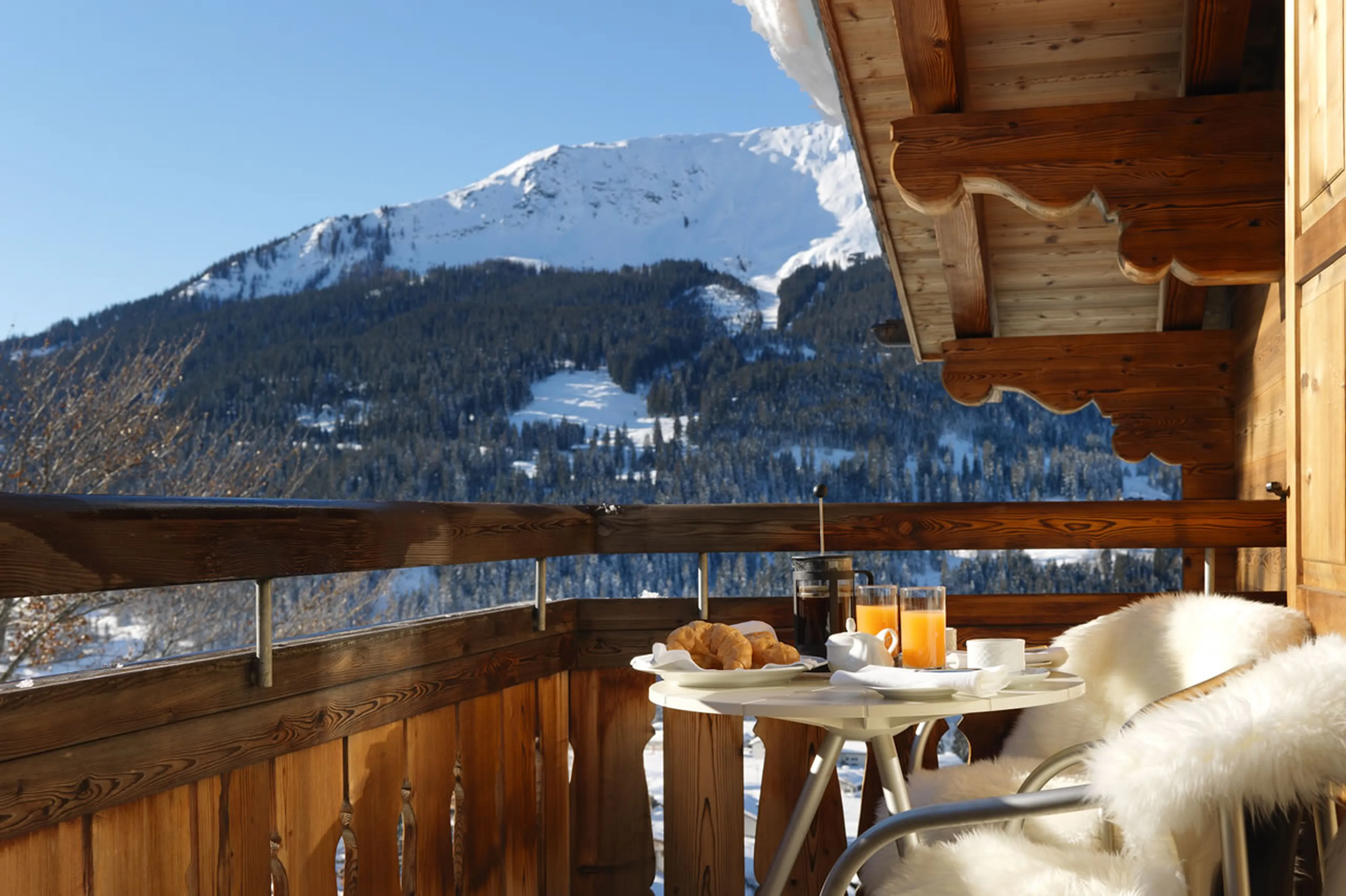 Breakfast on the balcony of Chesa Falcun in Klosters